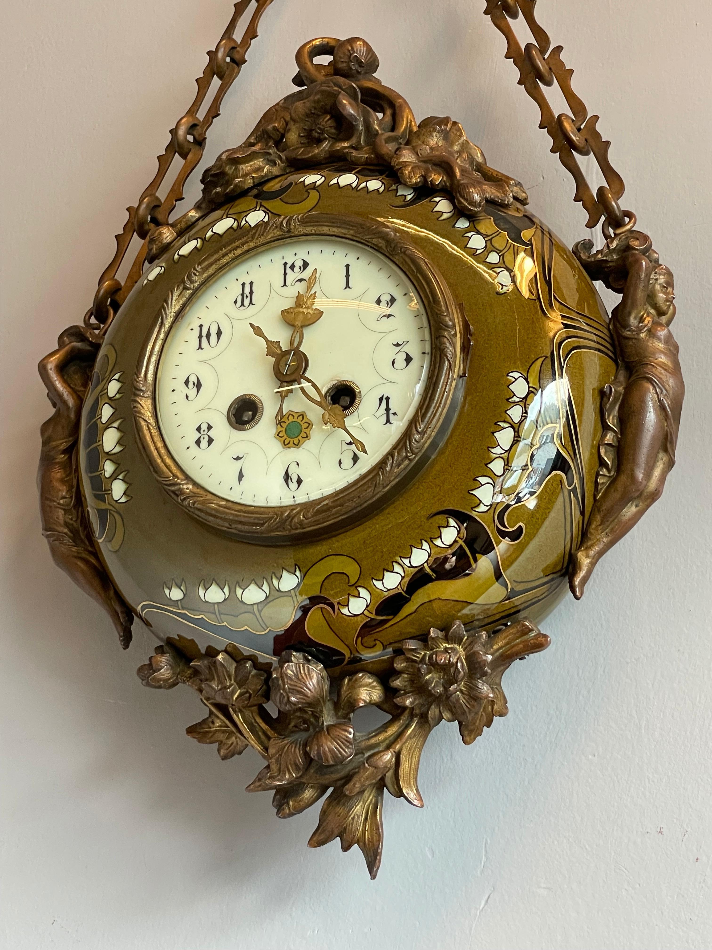 Stunning and perfect running wall clock from the European Art Nouveau and Jugendstil era.

If you like rare Arts and Crafts antiques in general and marvelous clocks in particular then this handcrafted wall clock from circa 1900-1910 could be the
