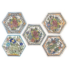 Piastrelle di ceramica antiche dipinte a mano