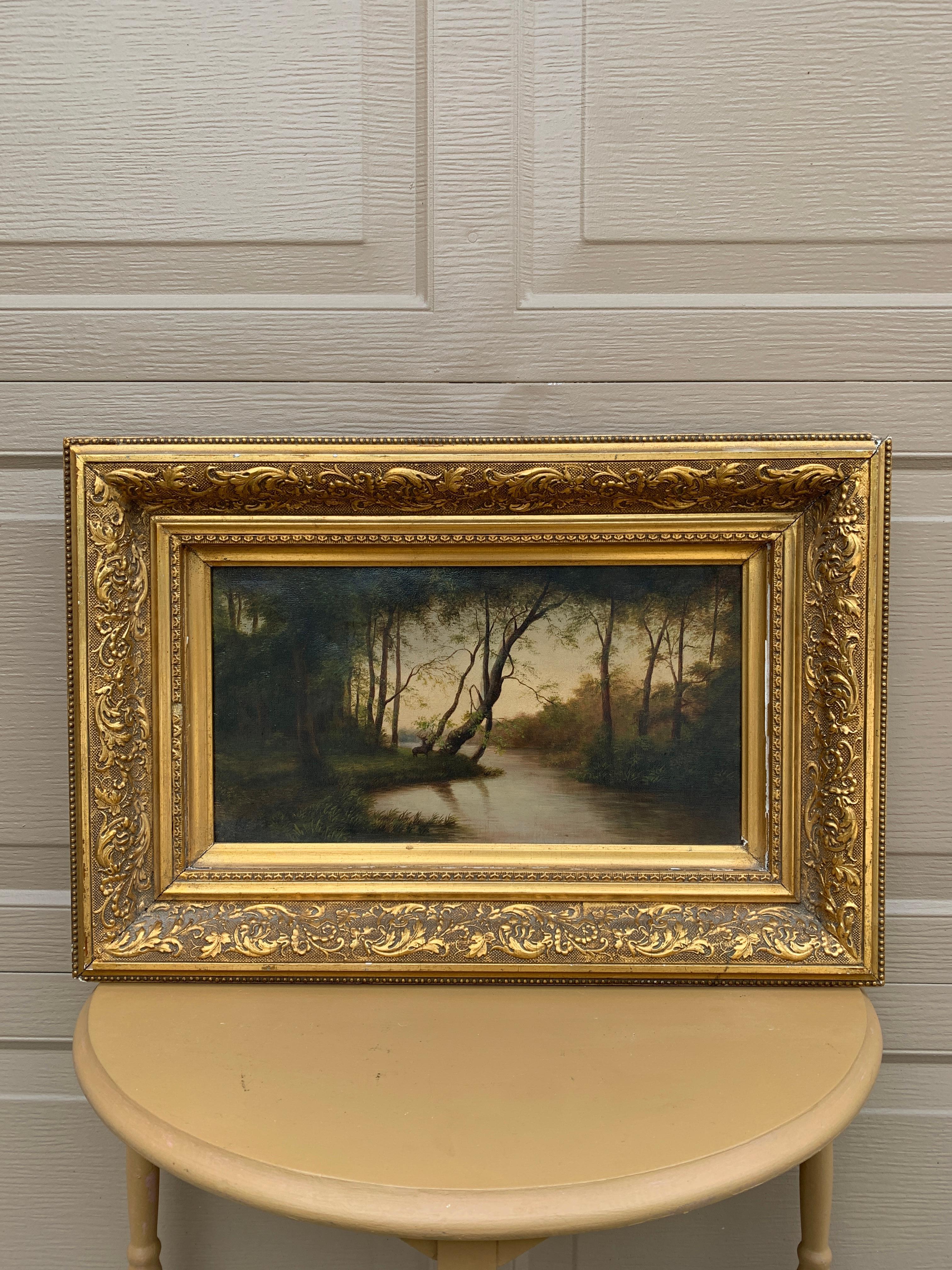 Magnifique huile sur toile peinte à la main dans un cadre en bois doré représentant une scène au bord d'une rivière au crépuscule, avec un cerf qui regarde.

Vendu par Marshall Field & Company Picture Galleries (étiqueté au verso)

États-Unis, fin