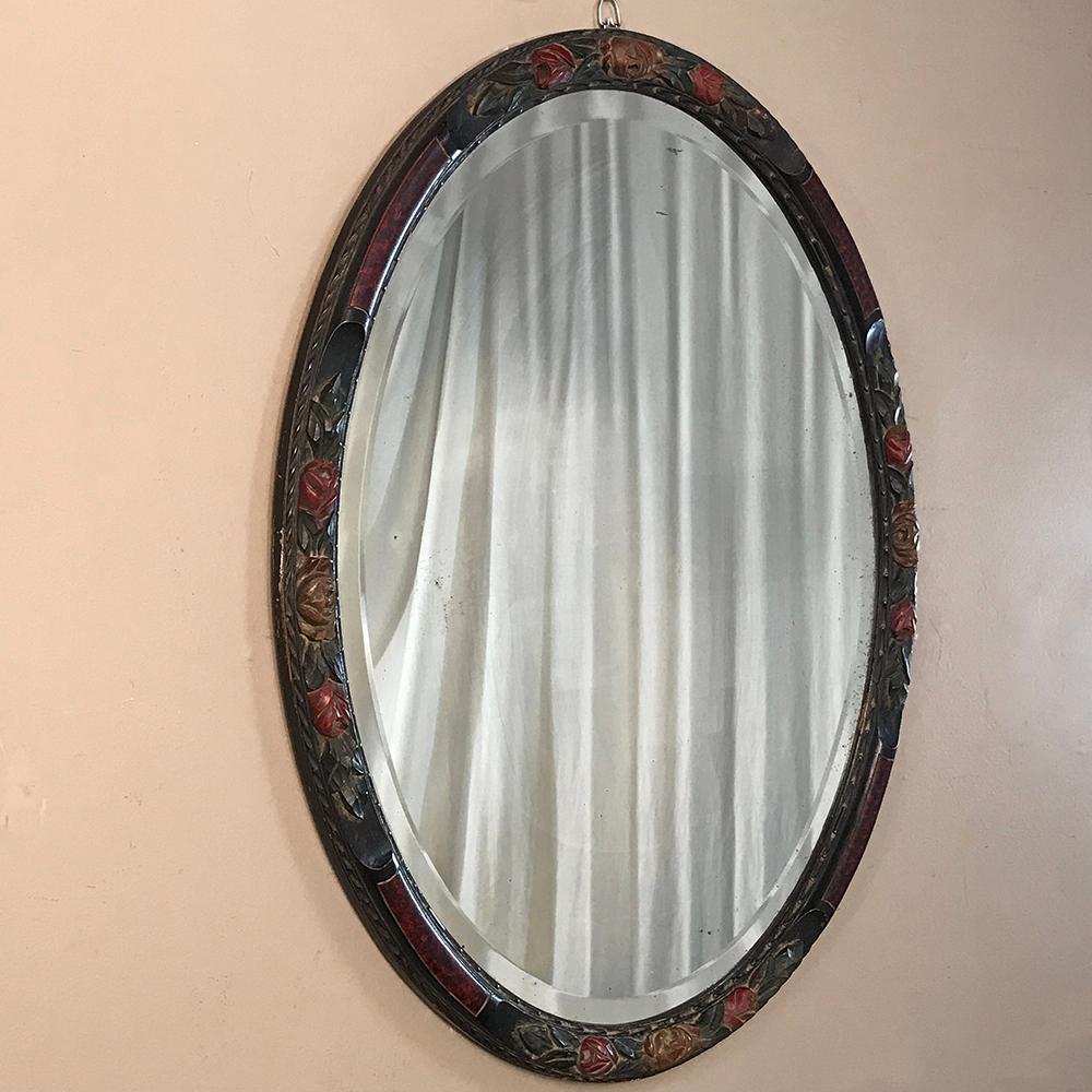 Antique Hand Painted French Oval Mirror with beveled glass is perfect for any room, powder room, or any niche that needs clean lines, creating a beautiful accent that magnifies the ambient light in the room! Charming floral carving around the entire