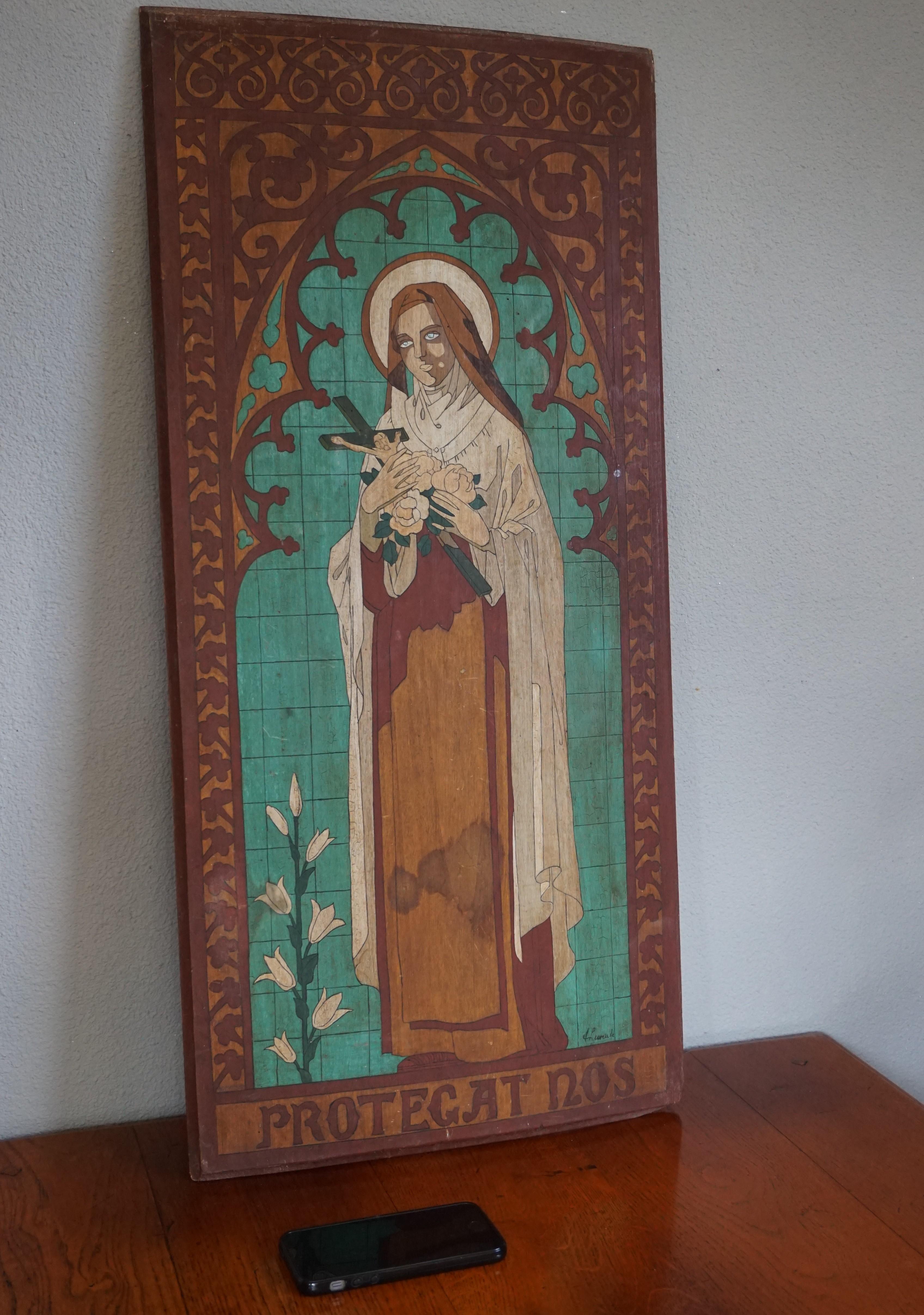 One of a kind, hand painted and signed work of religious art with a Latin phrase.

Saint Thérèse of Lisieux (1873-1897) is the patron saint of France and she is also known as Saint Thérèse of the Child Jesus and the Holy Face. She is popularly