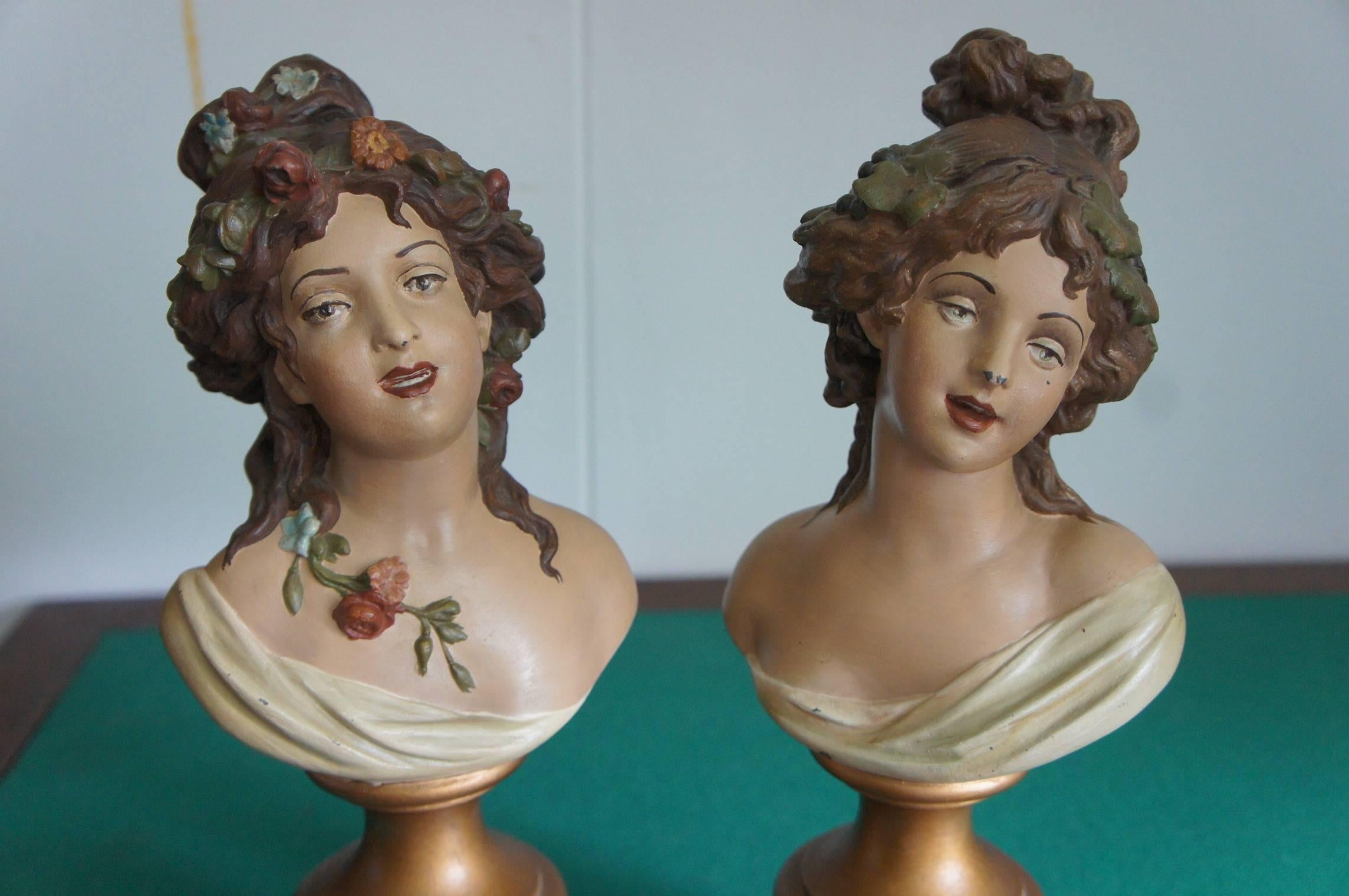 Rare pair of Rococo style lady sculptures in terra colors by Claude Michel, (1738-1814).

This beautiful pair of endearing and meaningful lady sculptures was originally made sometime in the late 1700s and the originals were cast in bronze. These