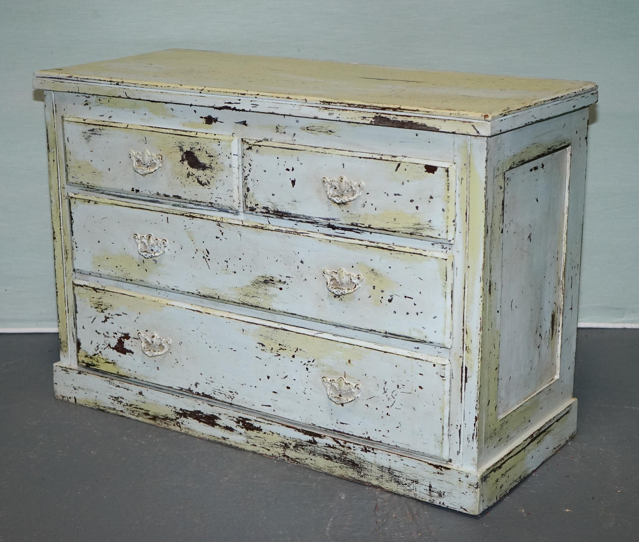 
Antiques of London



This antique three-drawer commode exudes authentic vintage charm, with a softly distressed, pale green-painted finish that has gracefully aged over time. Dating to the late 19th or early 20th century, it features solid