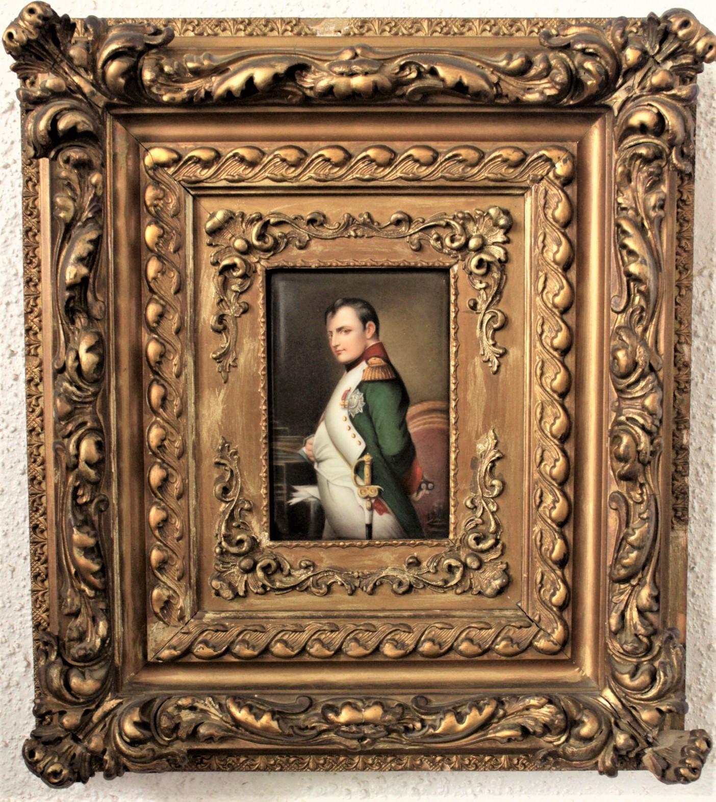 This well executed hand painted porcelain panel is unsigned, but presumed to have been done in France in approximately 1850 in a Renaissance style. The panel is an iconic depiction of Napoleon wearing his uniform. The plaque is framed in a very
