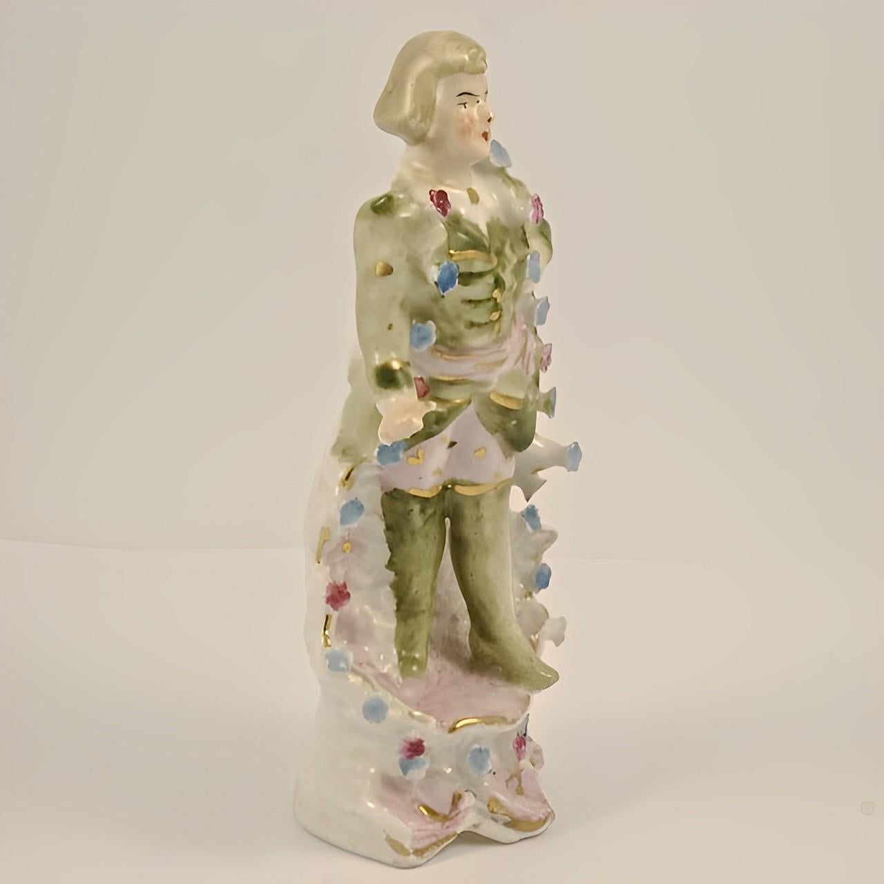 Antique Hand Painted Porcelain Man Figurine with Flowers In Good Condition For Sale In London, GB