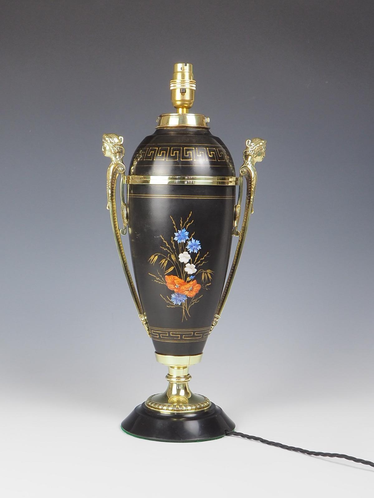 Antique 19th Century Hand Painted Porcelain Table Lamp by A J Hinks and Sons Birmingham.

This exquisite table lamp features a stunning black lacquer design adorned with a hand-painted lady on one side and delicate flowers on the other.

The lamp is