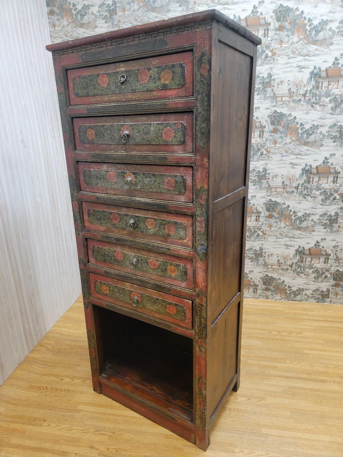 Antique hand painted Tibetan cabinet with drawers and display shelf

Original floral painting

The cabinet has 6 drawers and 1 display shelf

Circa: 1900s

Dimensions:

W 28