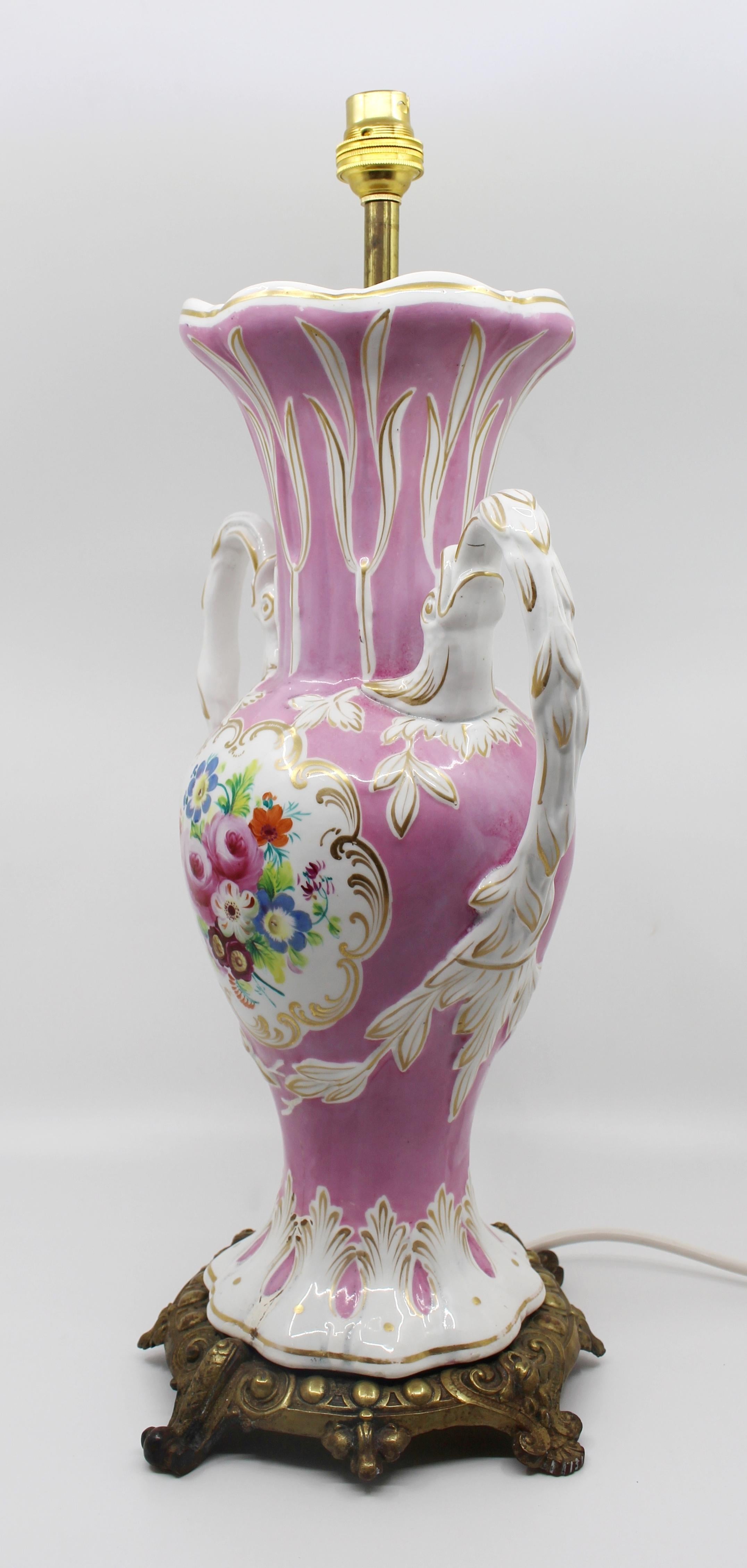 Period Late 19th century
Decoration Porcelain body, hand painted. Brass lamp holder and decorative brass base
Height 49 cm / 19 1/4 in
Condition old repair to base as pictured. Some wear to body and wear to gilding. Later lamp conversion

Pink