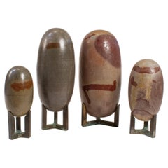 Antique Hand Polished Lingam Stone Sculptures with Bronze Stands Set of 4