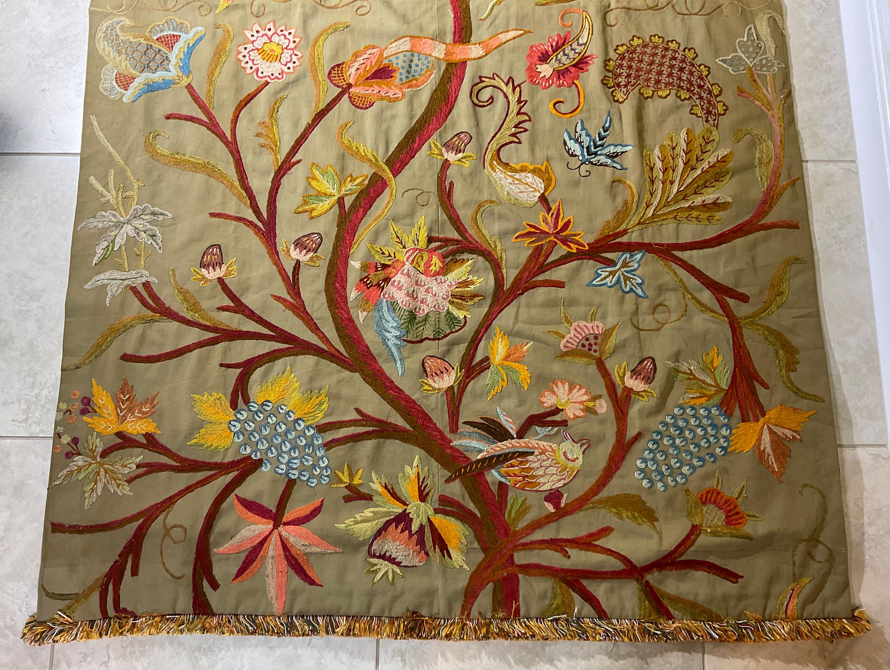 Exceptional needlepoint Hand stitched wall hanging beautiful colourful tree of life with birds bees ,butterflies, flowers and vines , All on a camel color background motifs.
Originally was used as curtain or valance ,then restored to use as wall