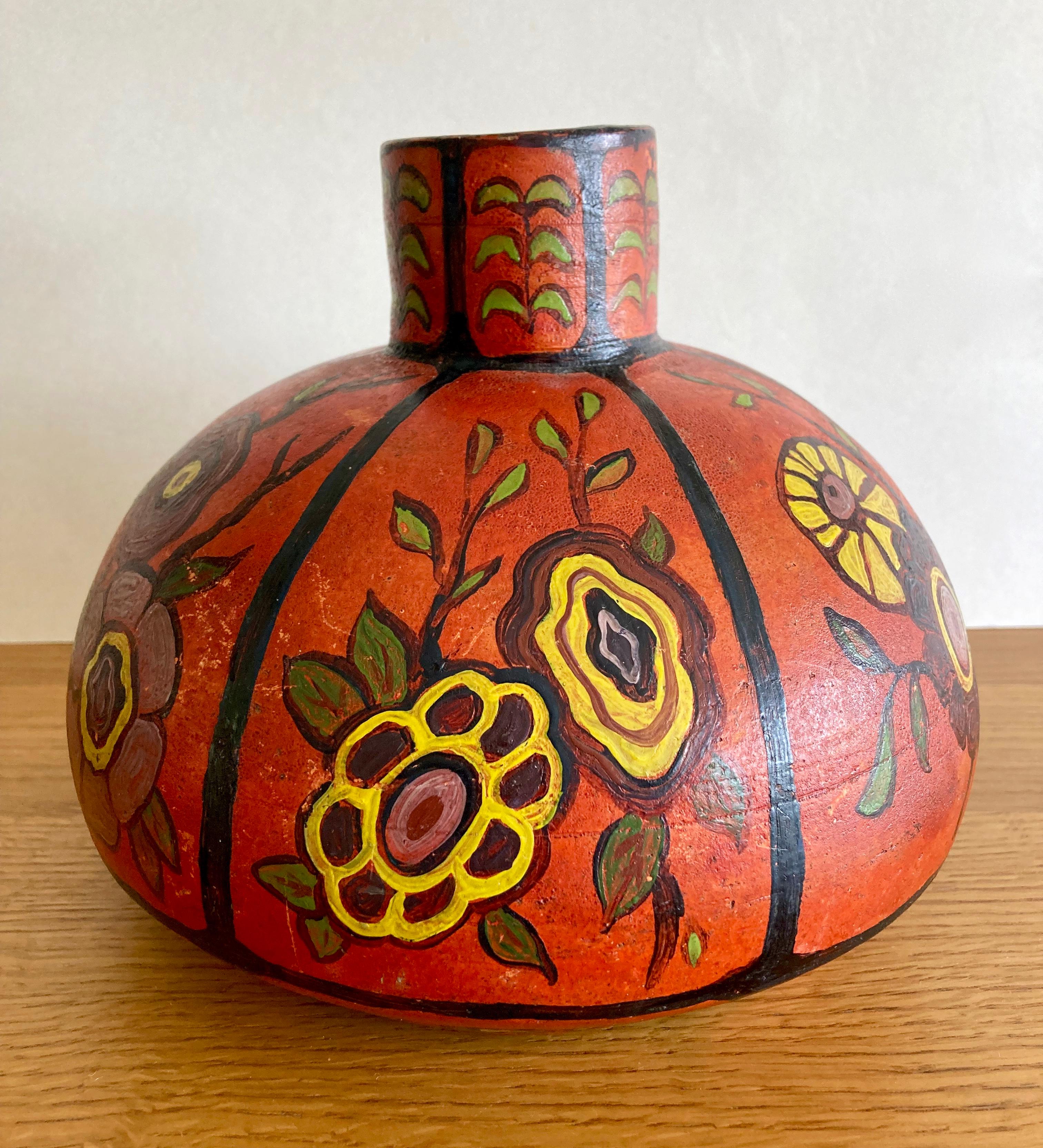 A one-of-a-kind, antique pottery vase. Definitely a statement piece.  

The vase has been sourced in Alsace, France. However, it has no maker's marks or signatures thus its origine and its date of fabrication are unknown. The vase has a very
