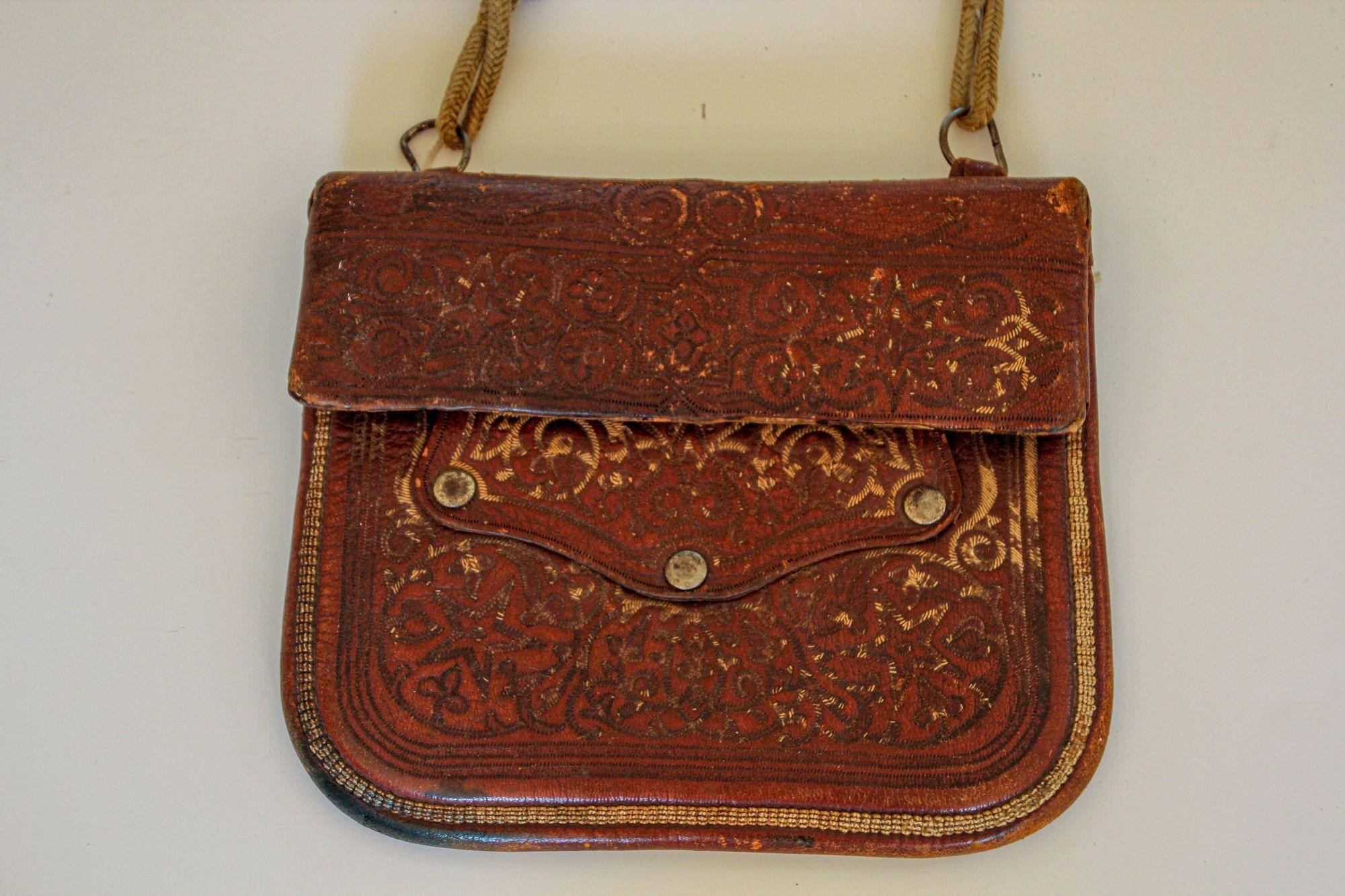 20th Century Antique Hand Tooled Leather Moroccan Bag Wall Decor For Sale