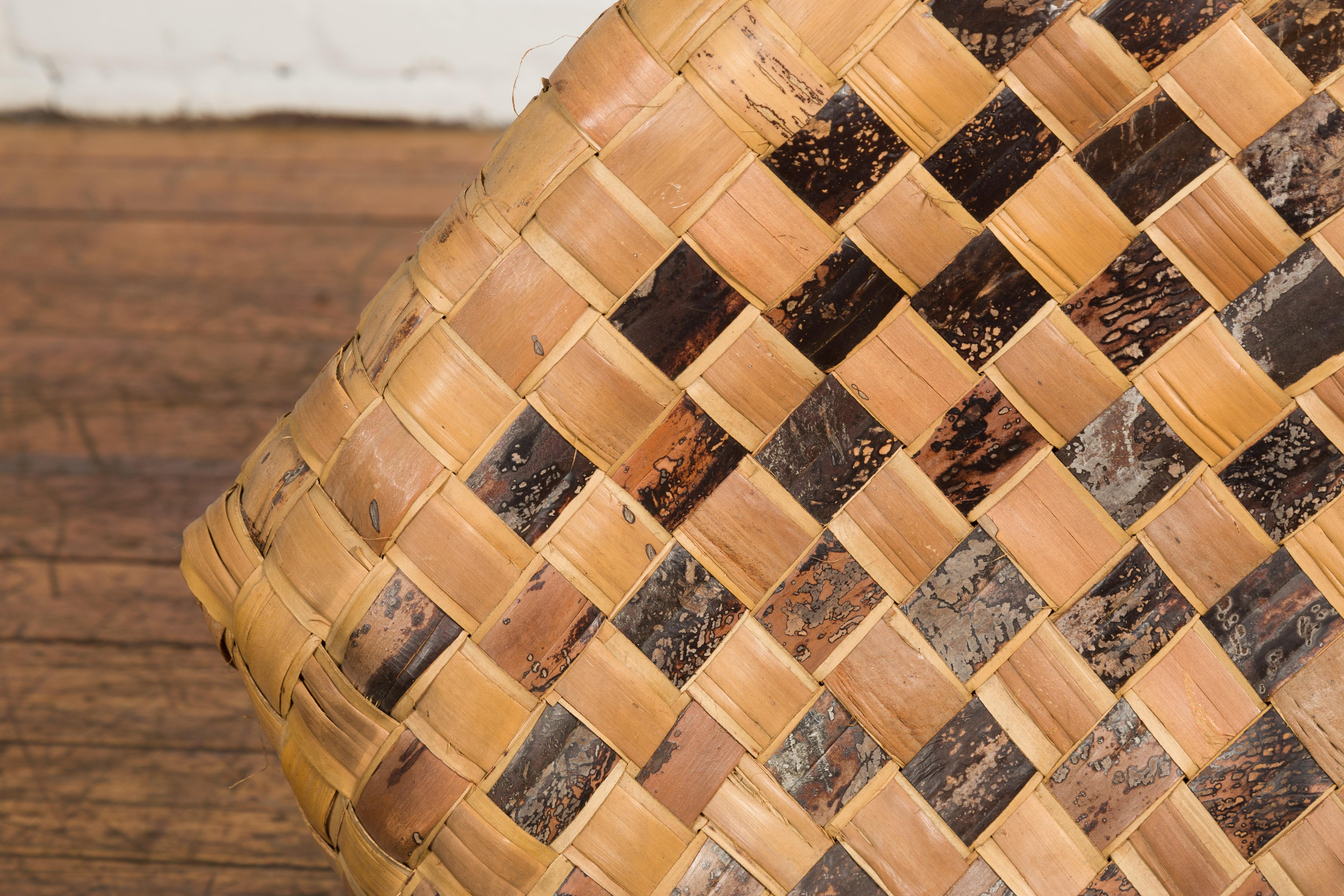 Antique Hand Woven Rustic Karagumoy Filipino Two Toned Grain Basket  In Good Condition For Sale In Yonkers, NY