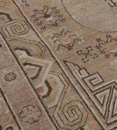 Antique Hand-Knotted Wool Khotan Rug, Floral Motifs, 19th Century