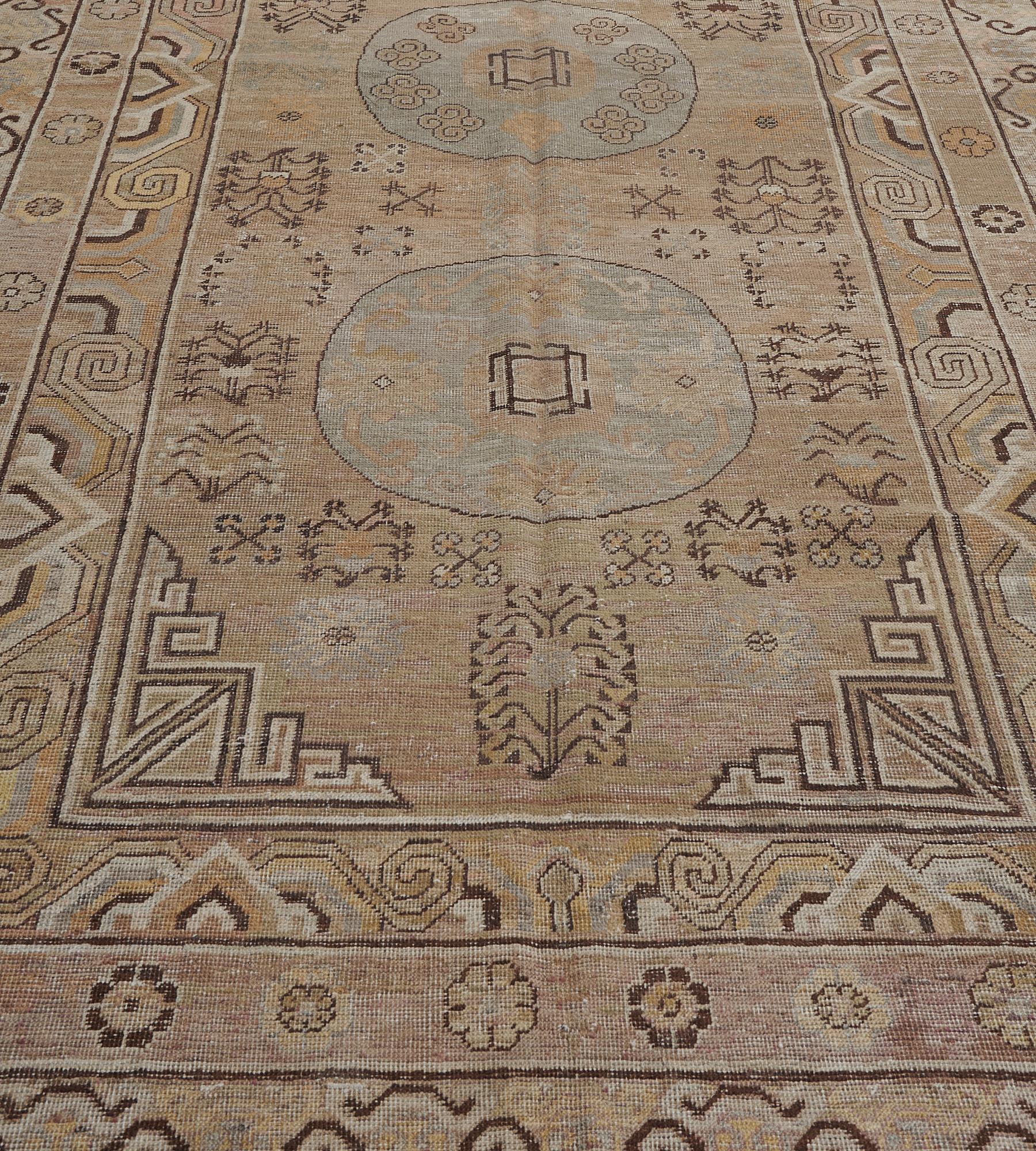Hand-Knotted Antique Hand-woven Wool Khotan Rug For Sale