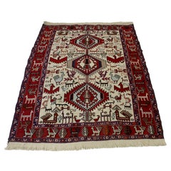 Tapis ancien tissé à la main Une belle pièce avec une large bordure