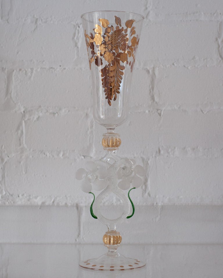 Heighten any table with an antique hand blown Murano glass flute/vase. Delicate and ornate, each glass is its own unique design and color, and no two Murano pieces are exactly the same. These are truly artisanal works, whether used for champagne, or