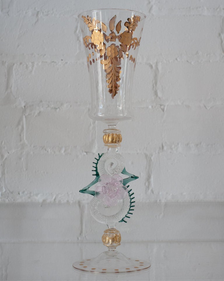 Heighten any table with an antique hand blown Murano glass flute/vase. Delicate and ornate, each glass is its own unique design and color, and no two Murano pieces are exactly the same. These are truly artisanal works, whether used for Champagne, or