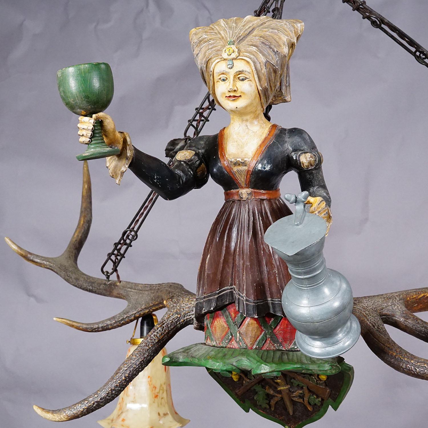 German Antique Handcarved Lusterweibchen of a Wine Waitress ca. 1920 For Sale