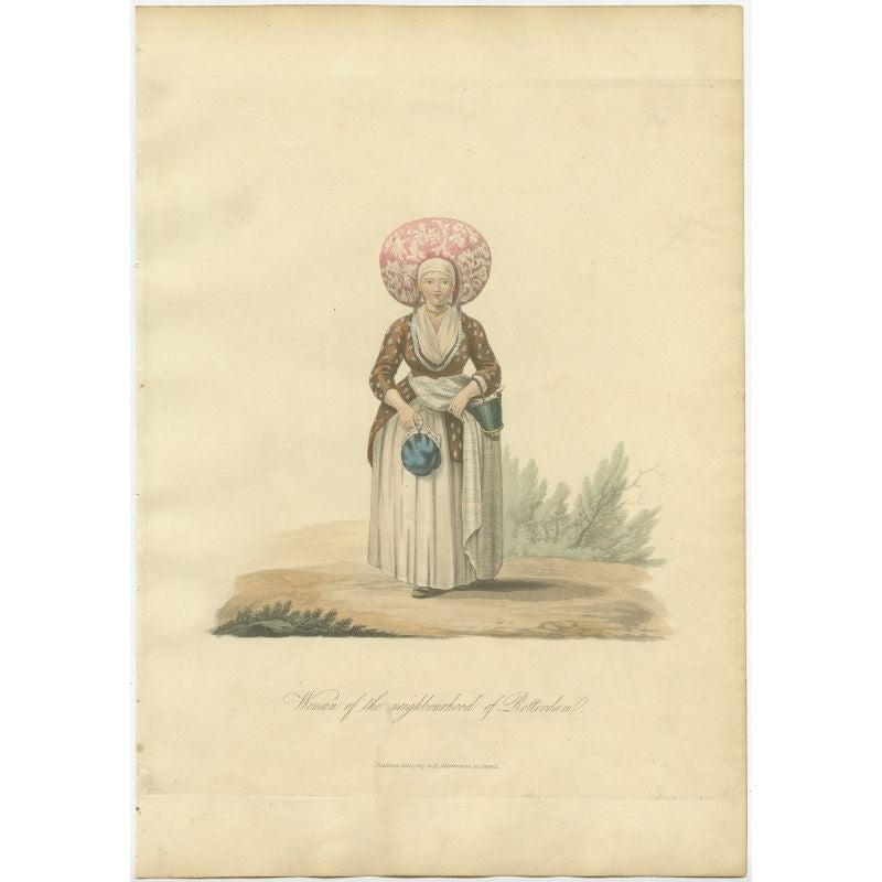 Antique costume print titled 'Woman of the neighbourhood of Rotterdam'. Old costume print depicting a woman from the region of Rotterdam. This print originates from 'The Costume of the Netherlands displayed in thirty coloured engravings'. 

Artists