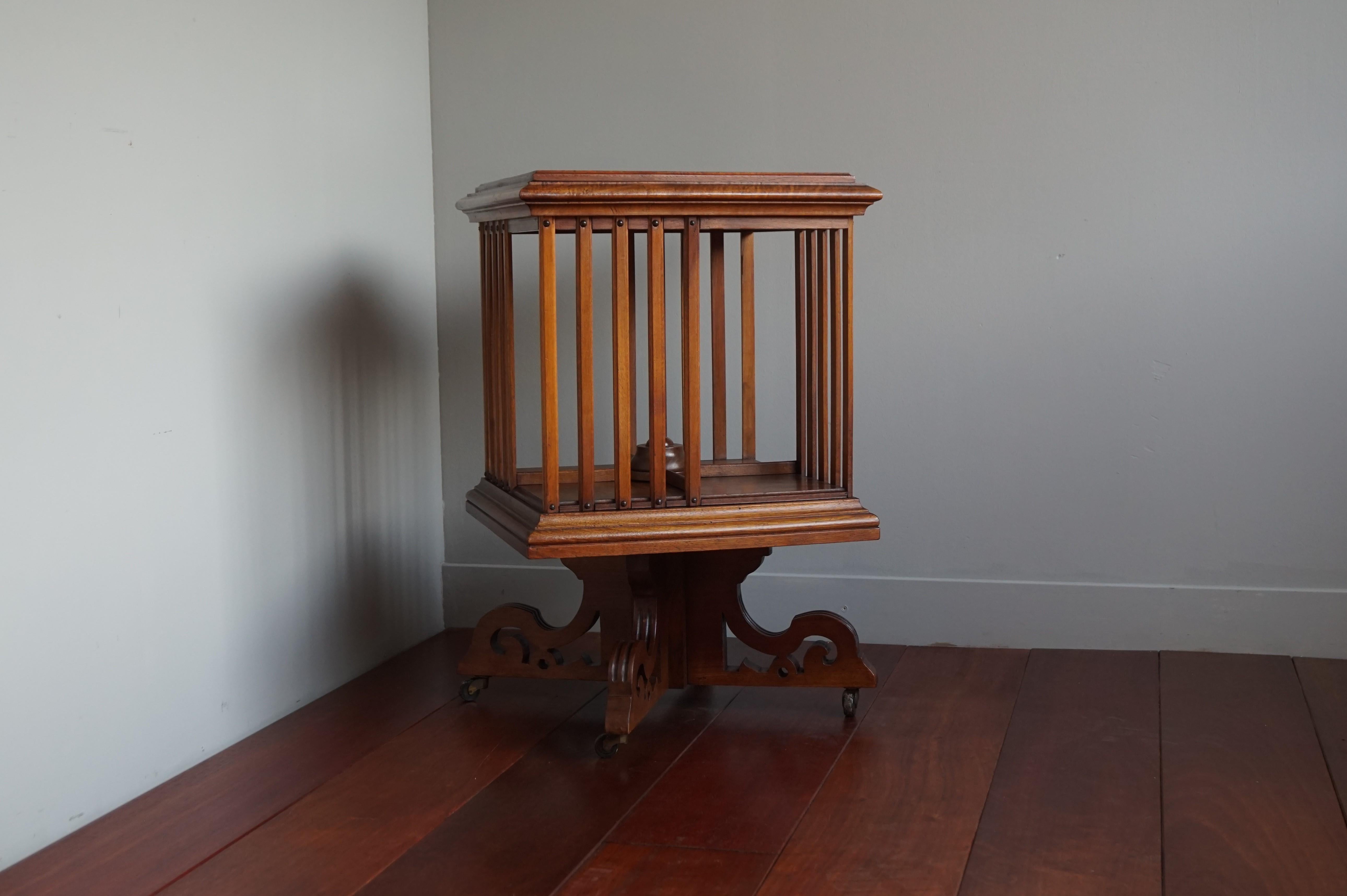 Small size, striking and practical revolving bookcase / end table.

Apart from being rare, stylish and beautiful this early 1900s and all handcrafted revolving bookcase is extra practical, because of its relatively small size. Most of these antique