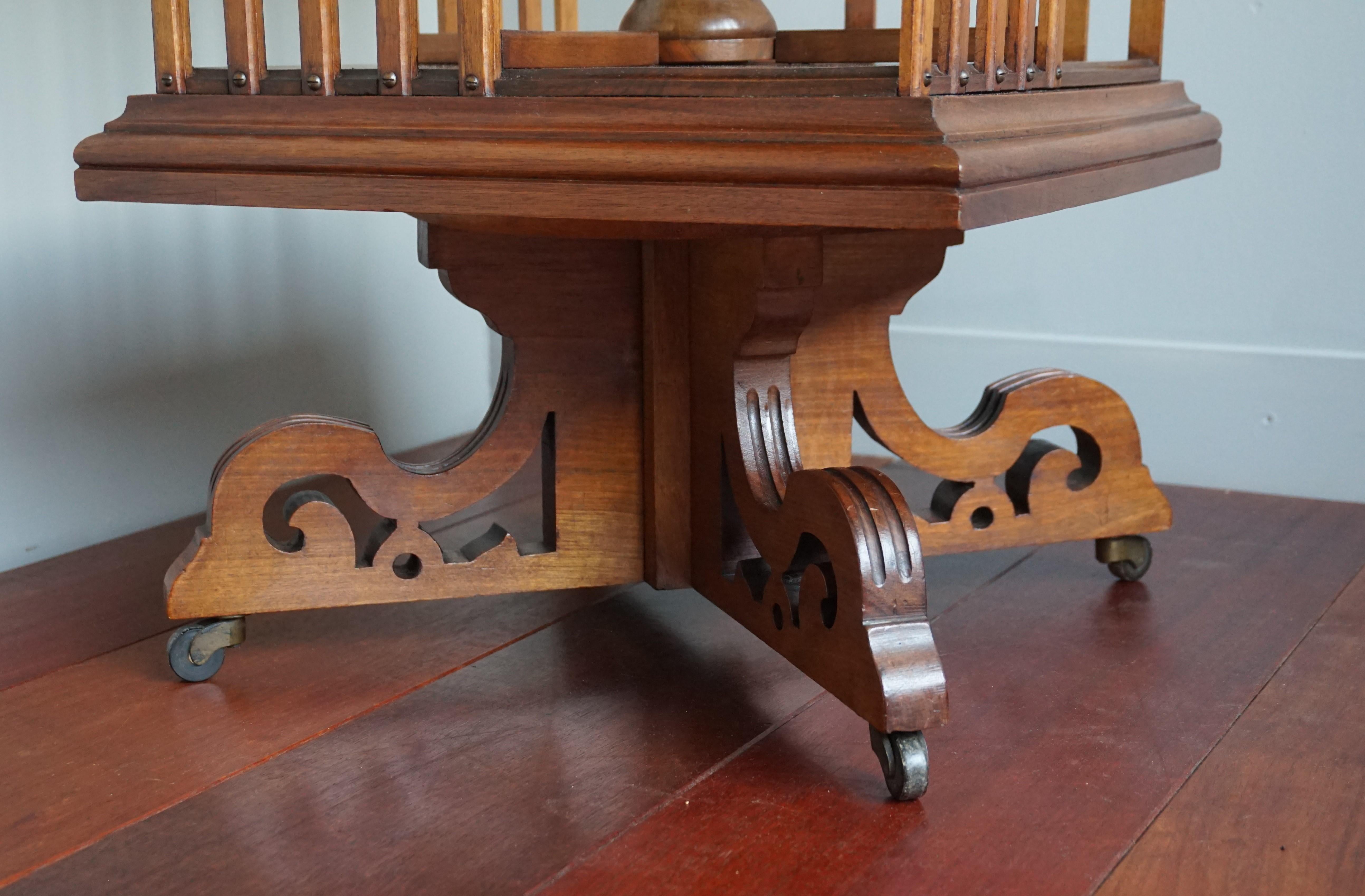 20th Century Antique Handcrafted Nutwood Revolving Bookcase w. Original Brass & Wooden Wheels