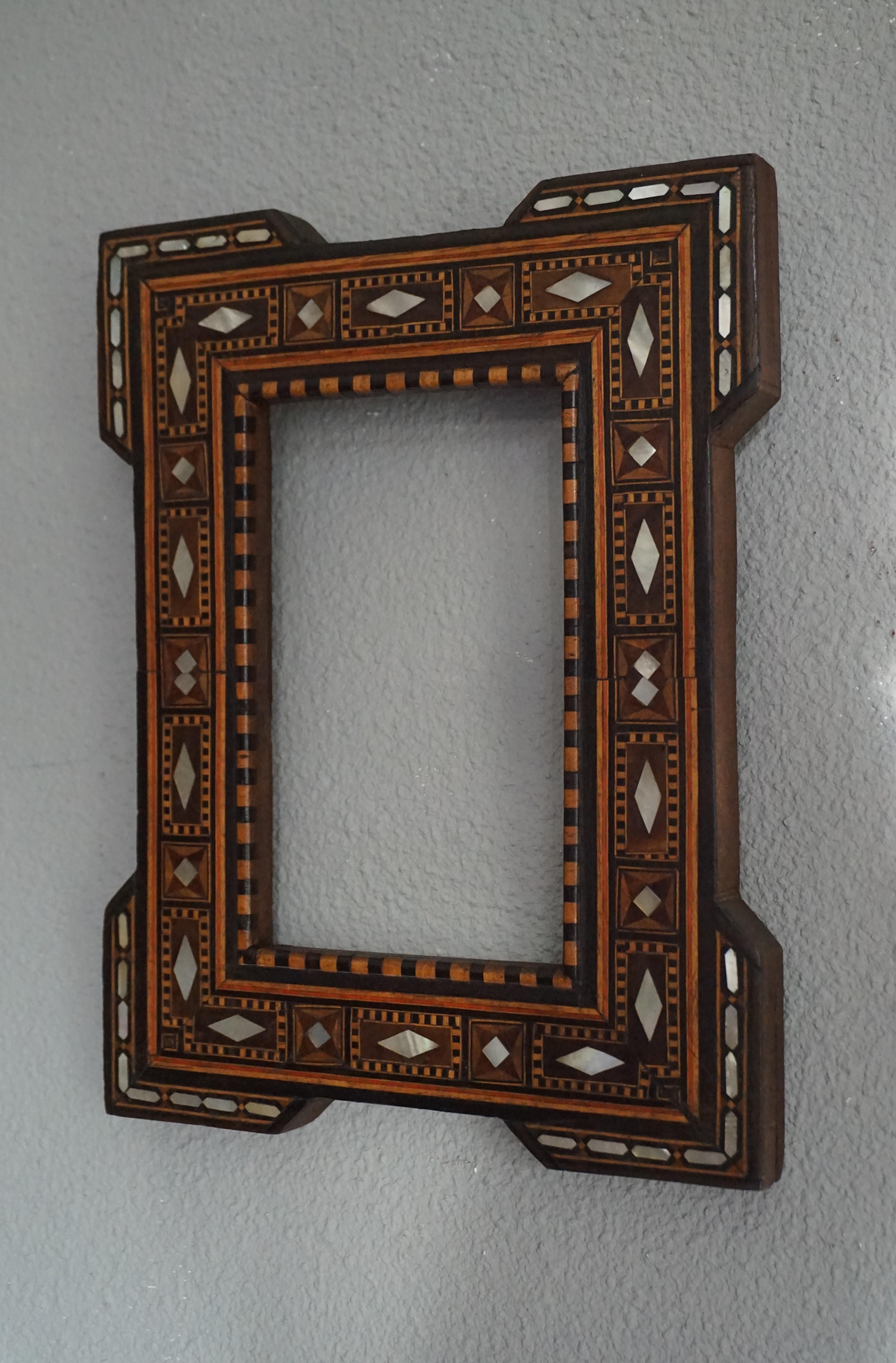 All handcrafted and very stylish pair of photo frames with inlaid Islamic designs.

You don't necessary need to have an Arabic (inspired) interior to fall in love and decorate your home with these stunning Moorish picture frames. The workmanship is