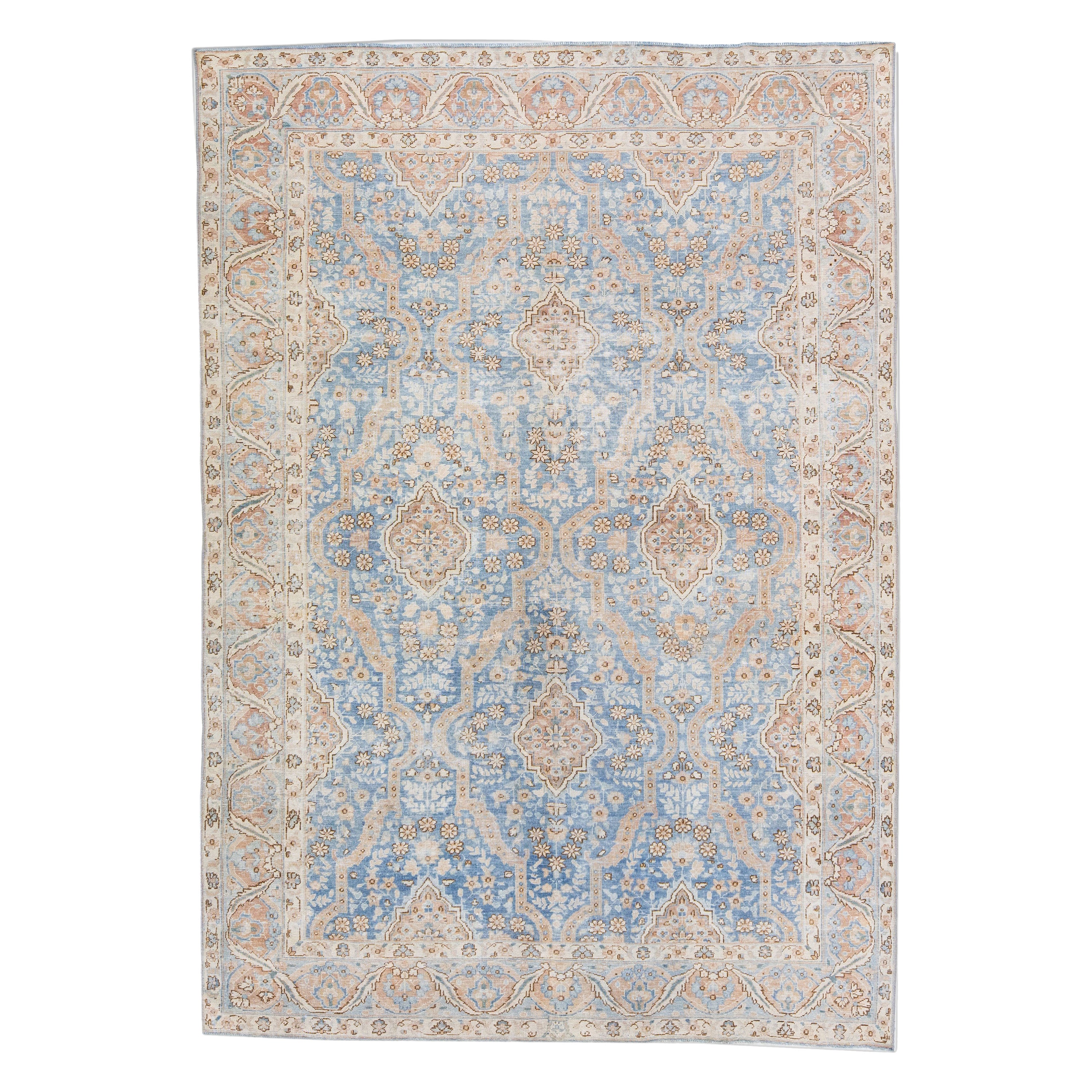 Tapis persan ancien en laine bleue de Tabriz fait à la main avec motif sur toute sa surface