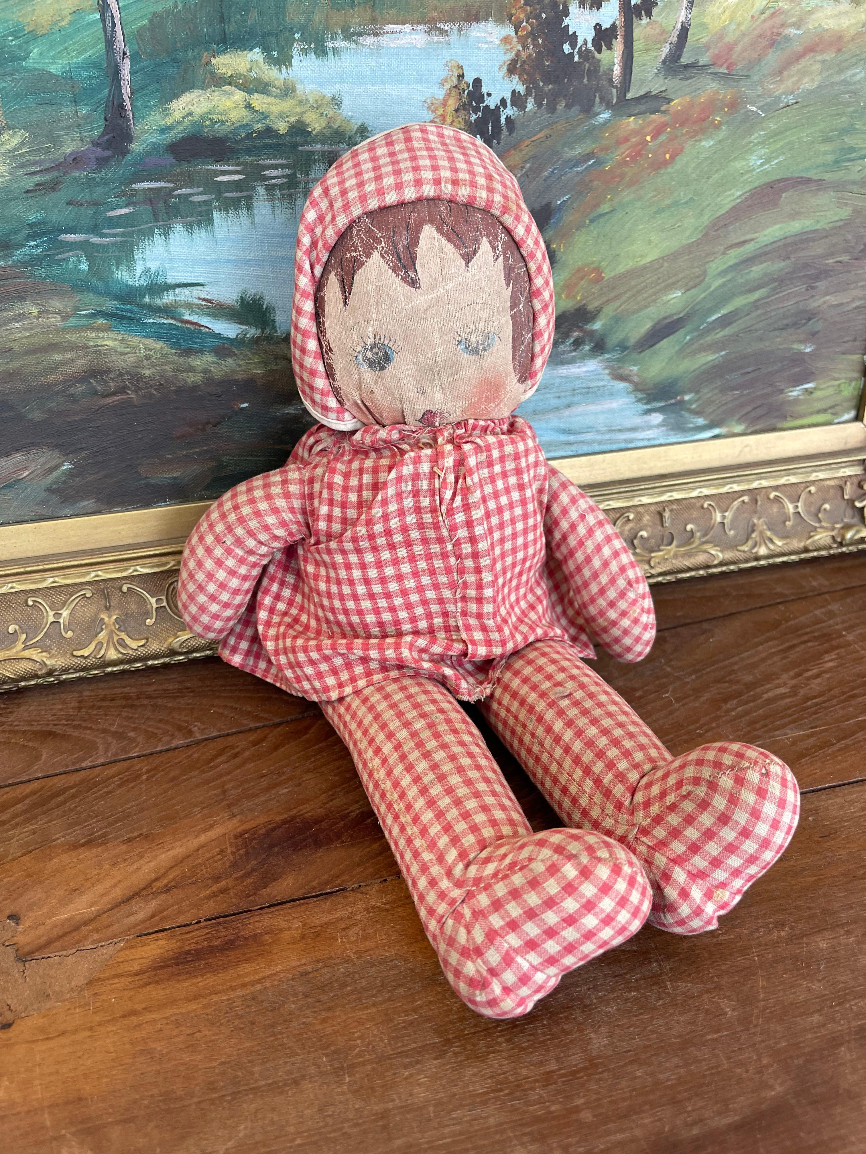 Mid-Century Modern Antique Handmade Cloth Doll with Painted Face and Red Gingham Outfit For Sale