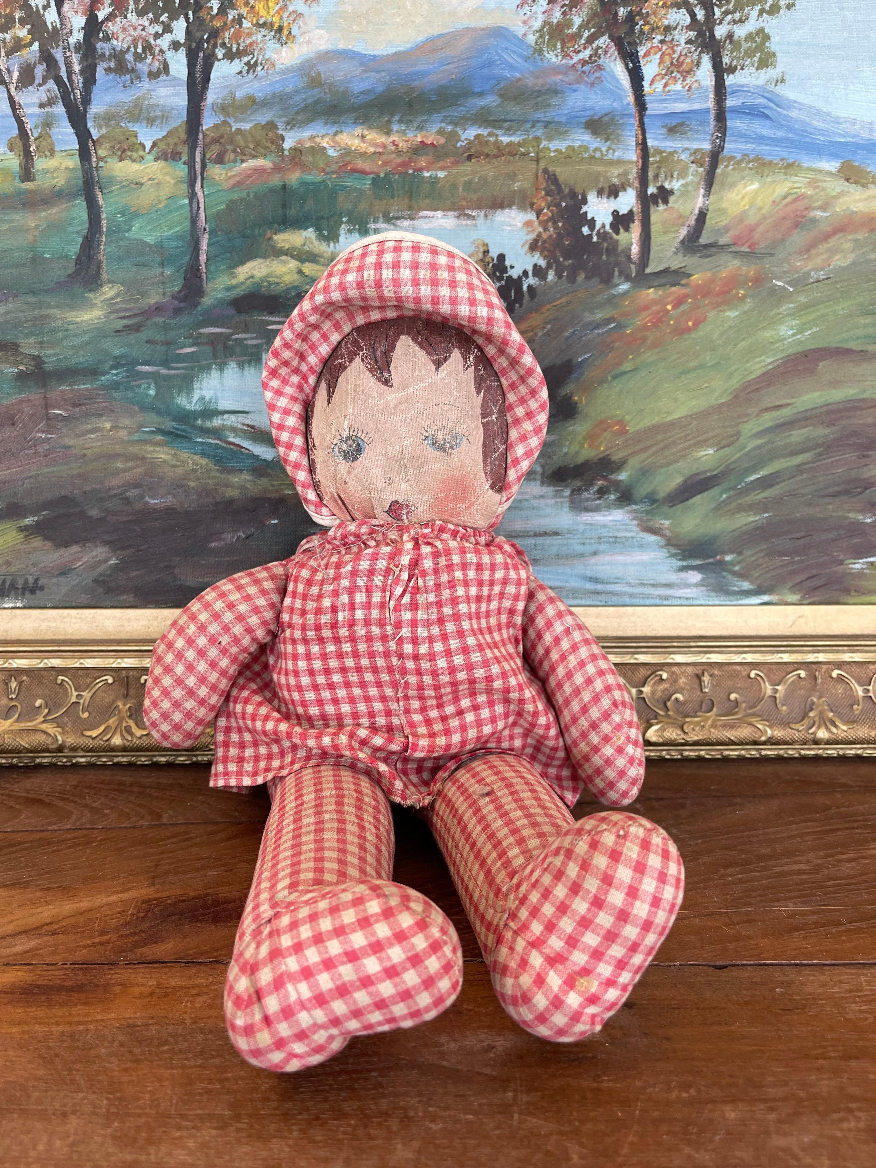 20th Century Antique Handmade Cloth Doll with Painted Face and Red Gingham Outfit For Sale