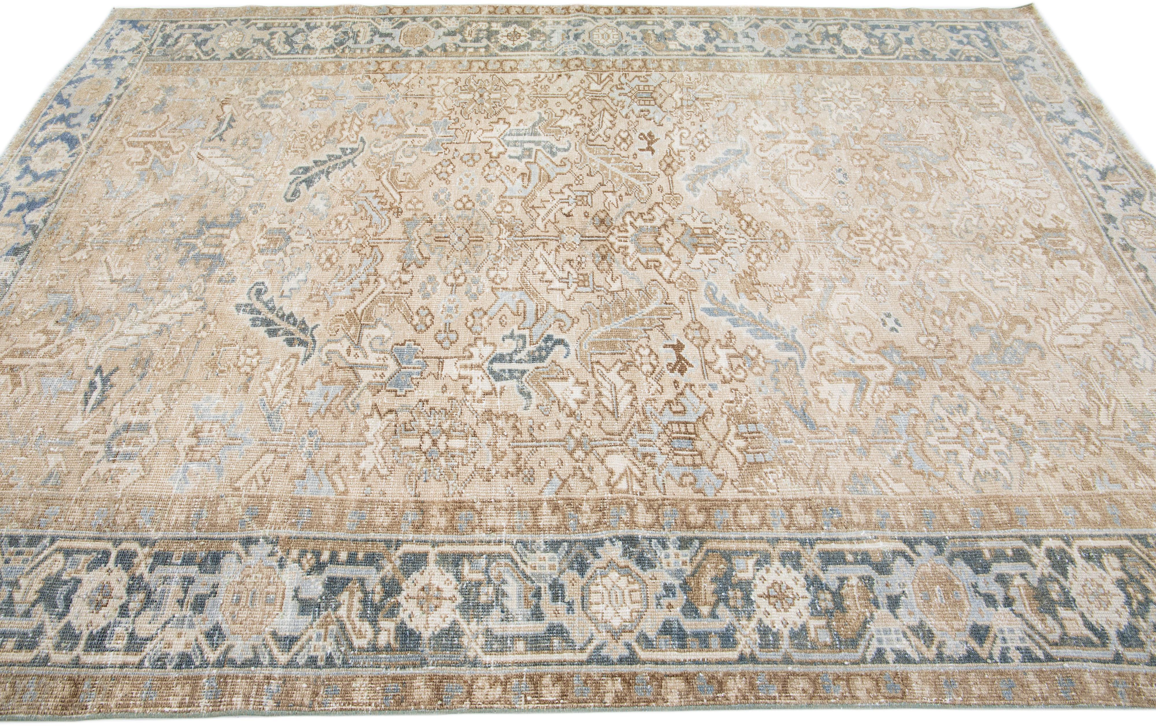 Hand-Knotted Antique Handmade Heriz Persian Wool Rug with a Beige Field For Sale