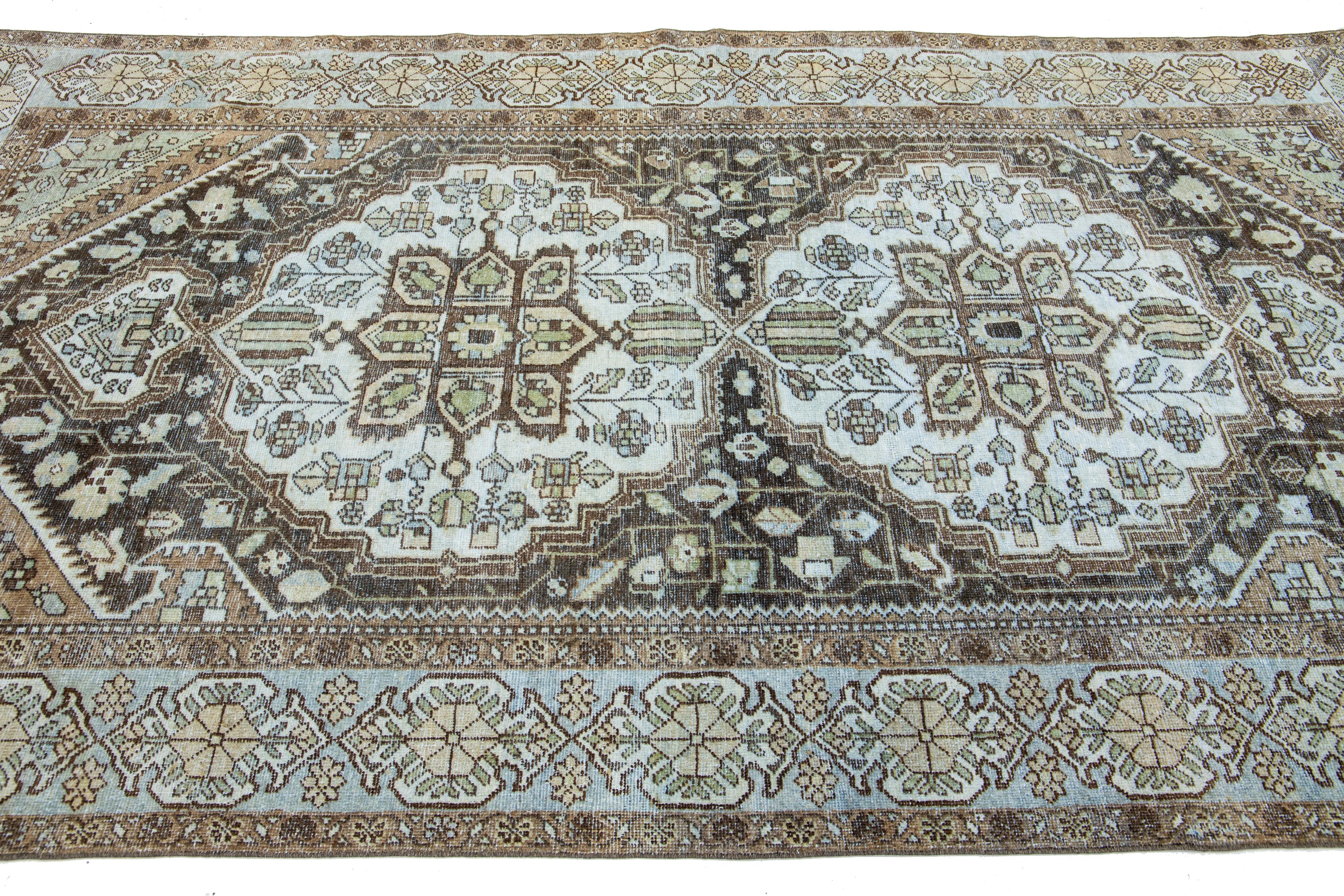 Persian Antique Handmade Mahal Wool Rug with Rosette Design In Brown For Sale