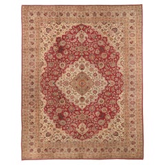 Tapis persan ancien fait à la main, motif Mashad