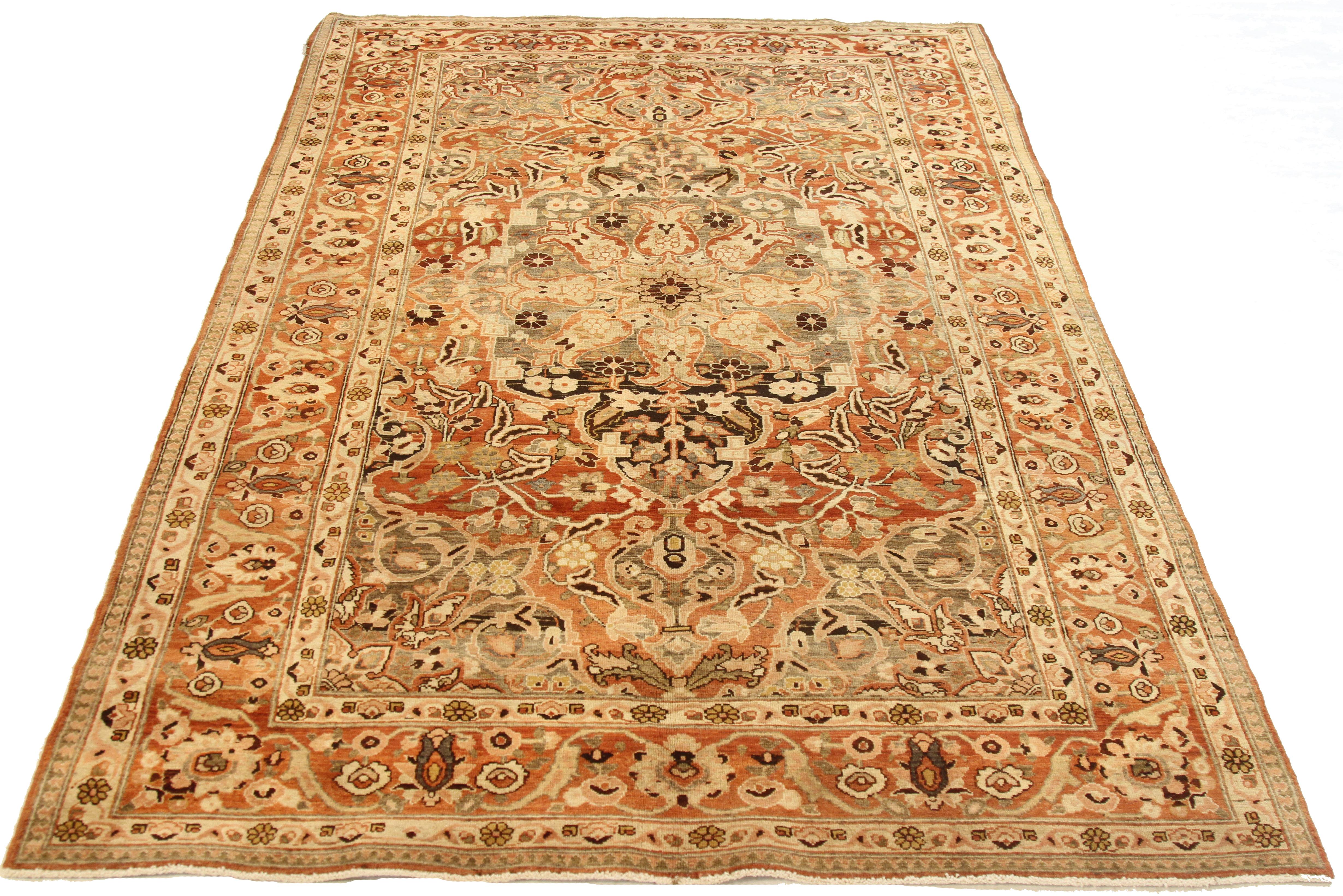Antique hand-woven Persian area rug made from fine wool and all-natural vegetable dyes that are safe for people and pets. This beautiful piece features a rich field of tribal and floral details in various colors which is the traditional weaving