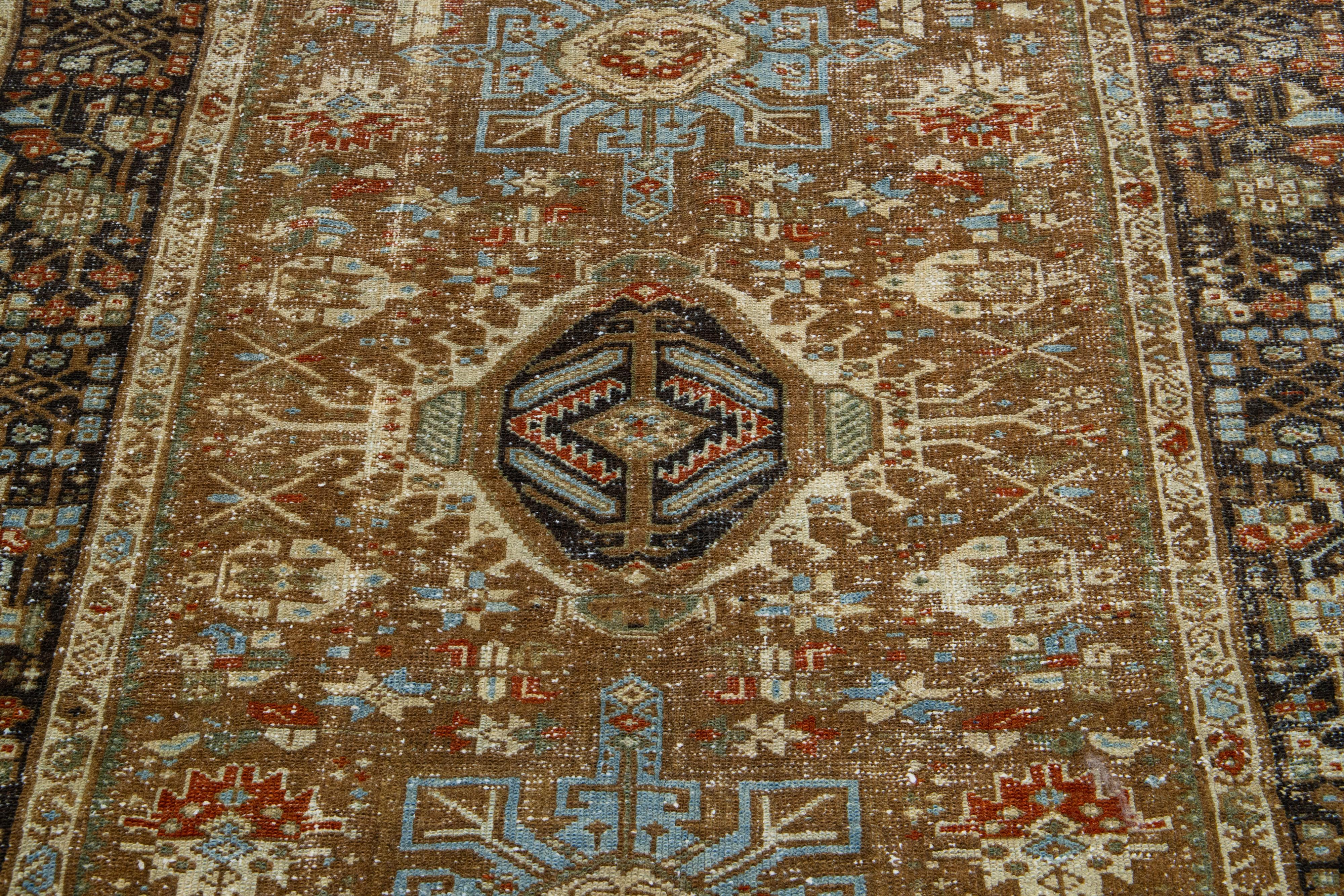 20th Century Antique Handmade Persian Scatter Wool Rug with Brown Field For Sale