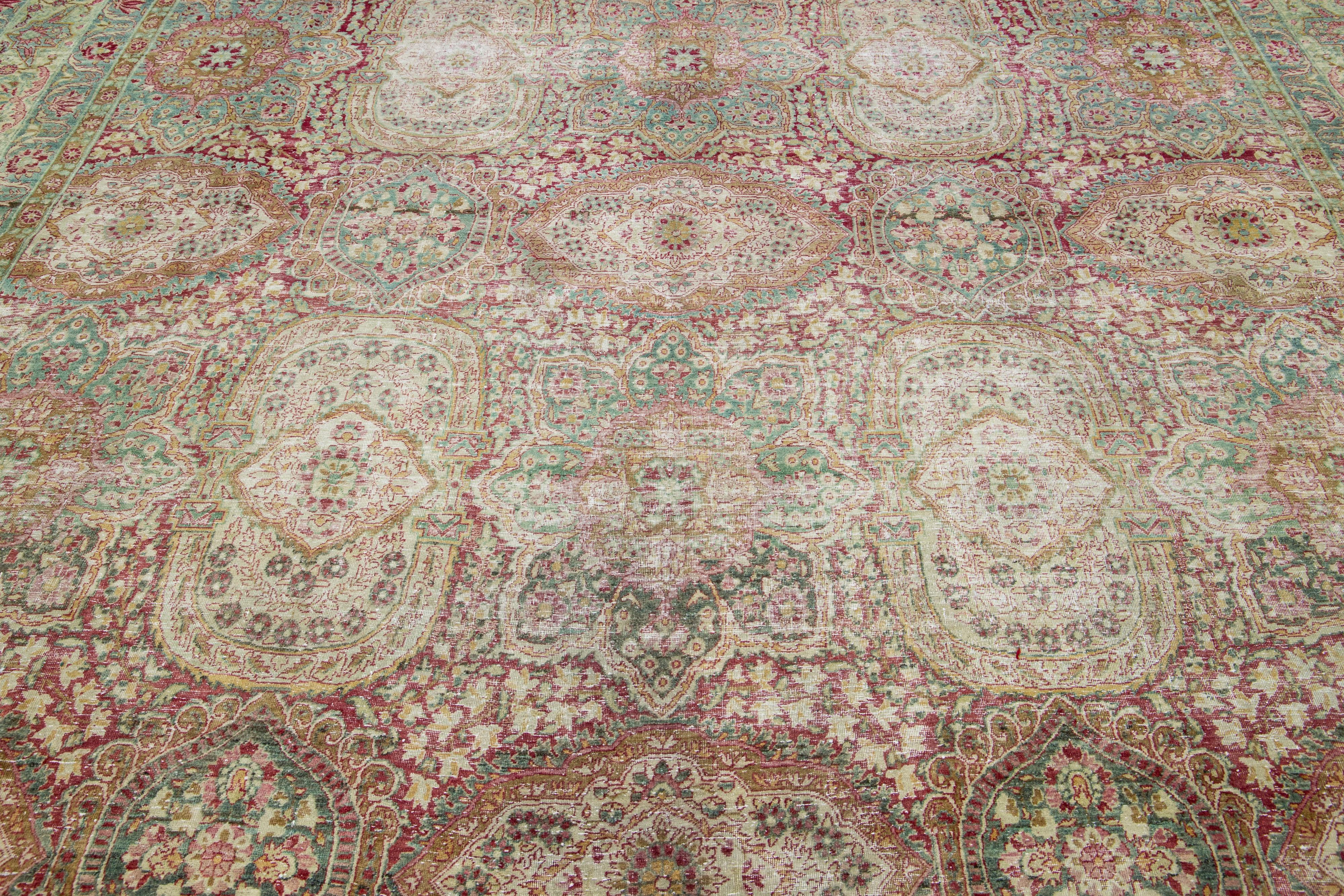 20th Century Antique Handmade Wool Rug Persian Kerman with Multicolor Floral Motif For Sale