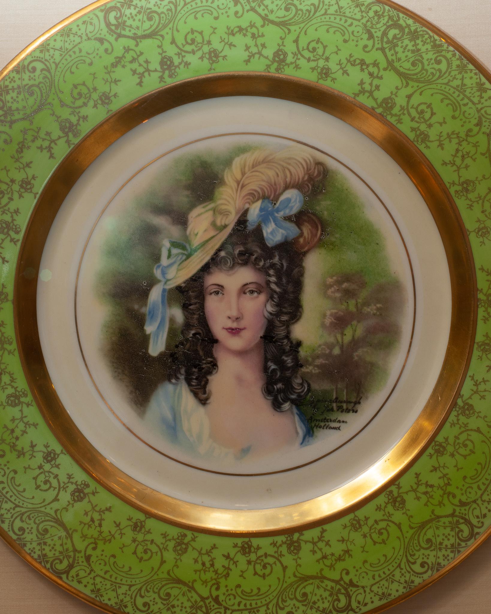 A stunning antique handprinted Osborne China 24K gold plate, mounted in a custom framed shadowbox lined with silk.