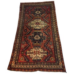 Antiker handgewebter kaukasischer Teppich