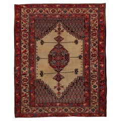 Ancien tapis en laine Malayer tissé à la main avec médaillon central et bordure géométrique