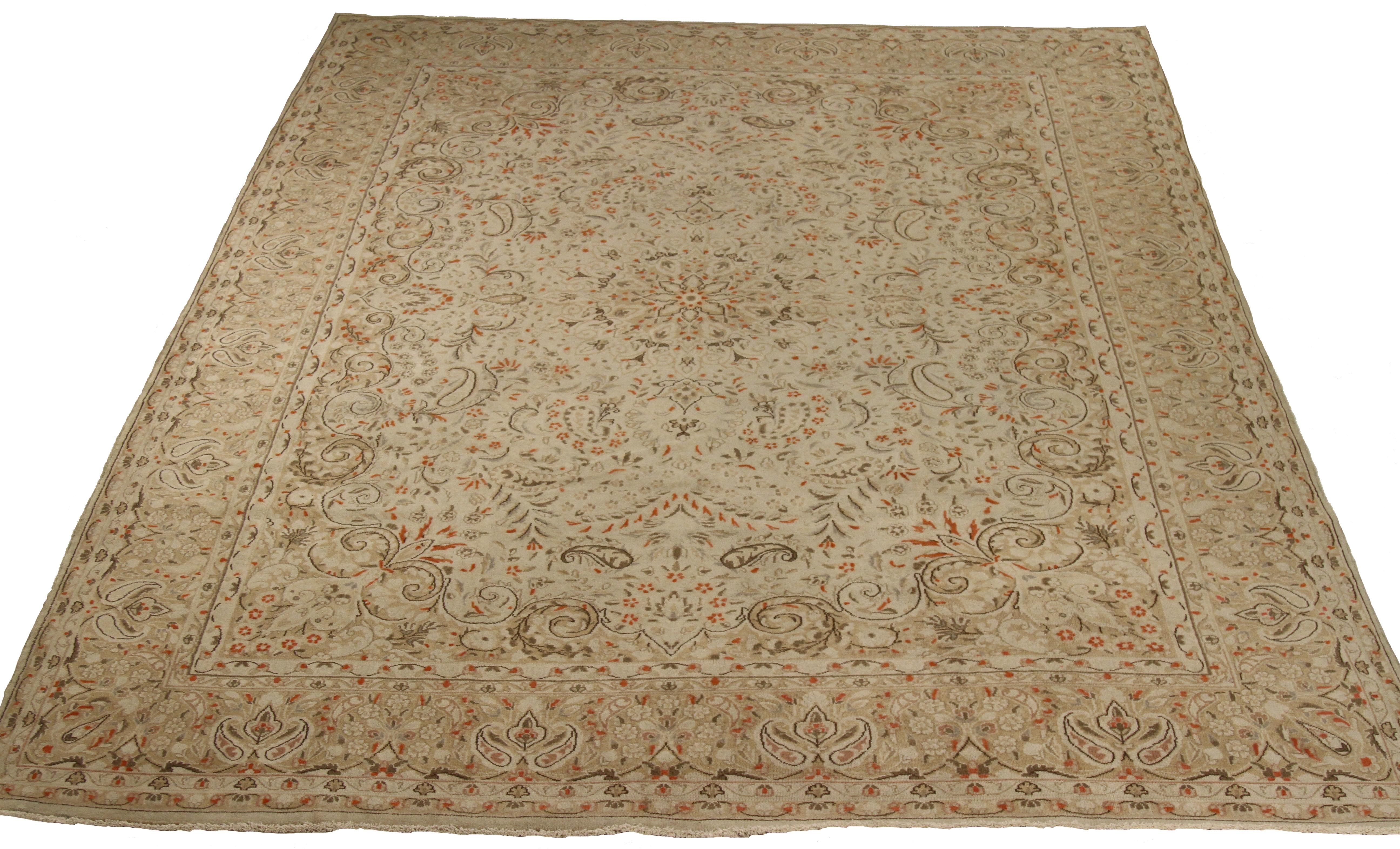 Antique hand-woven Persian area rug made from fine wool and all-natural vegetable dyes that are safe for people and pets. It features traditional Kerman weaving depicting 