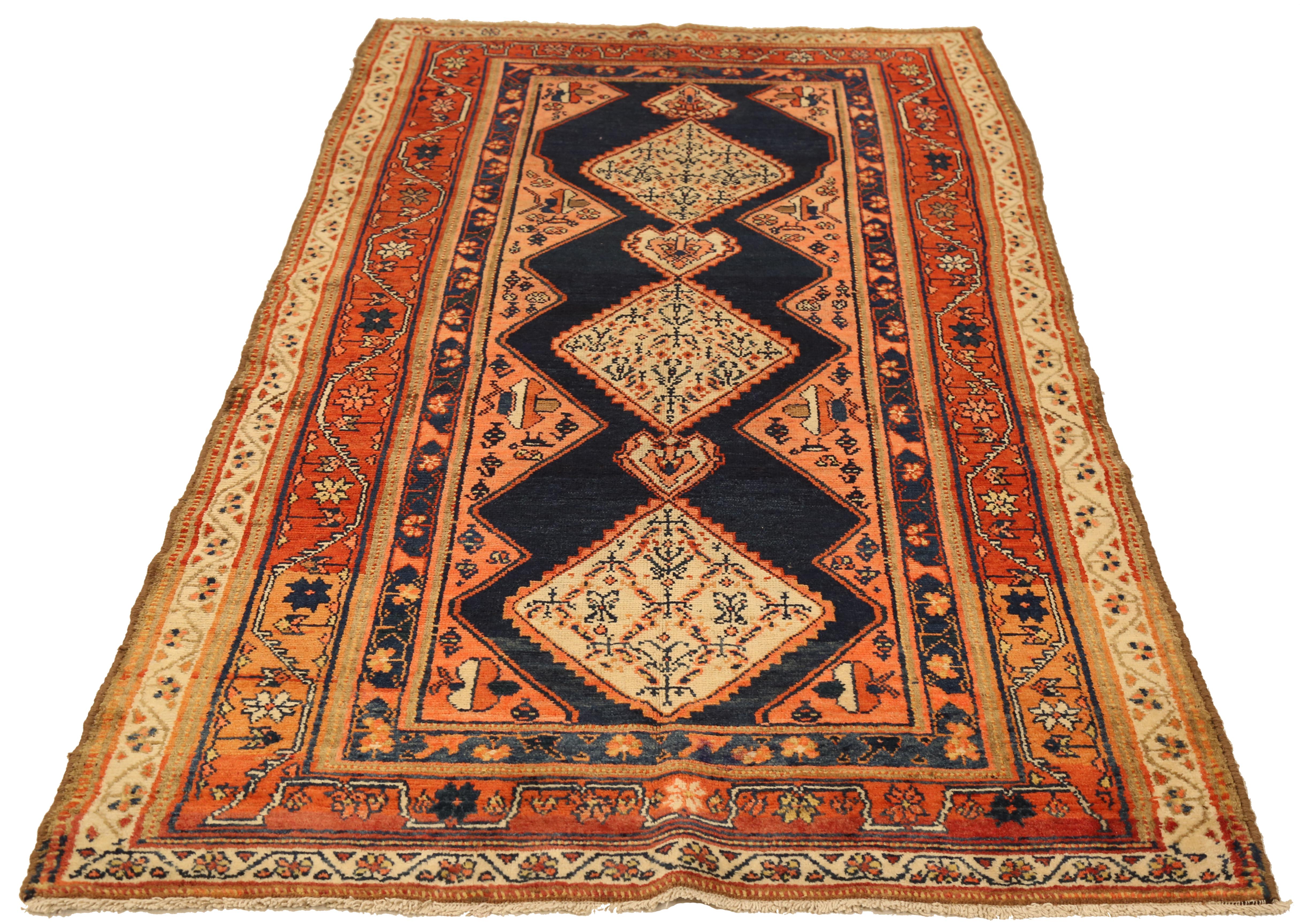 Antique hand-woven Persian area rug made from fine wool and all-natural vegetable dyes that are safe for people and pets. It features traditional Malayer weaving depicting elaborate 'Boteh' patterns that represents life and eternity in Persian