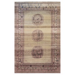 Antiker handgewebter Khotan-Teppich aus Wolle