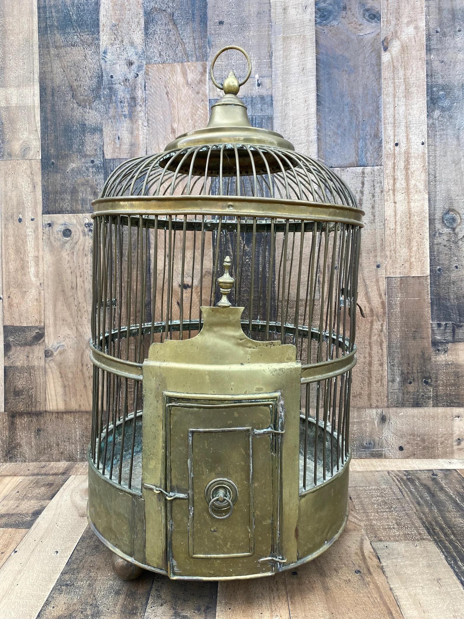 Antique Hanging Chinese Birdcage with beautiful brass patina.


