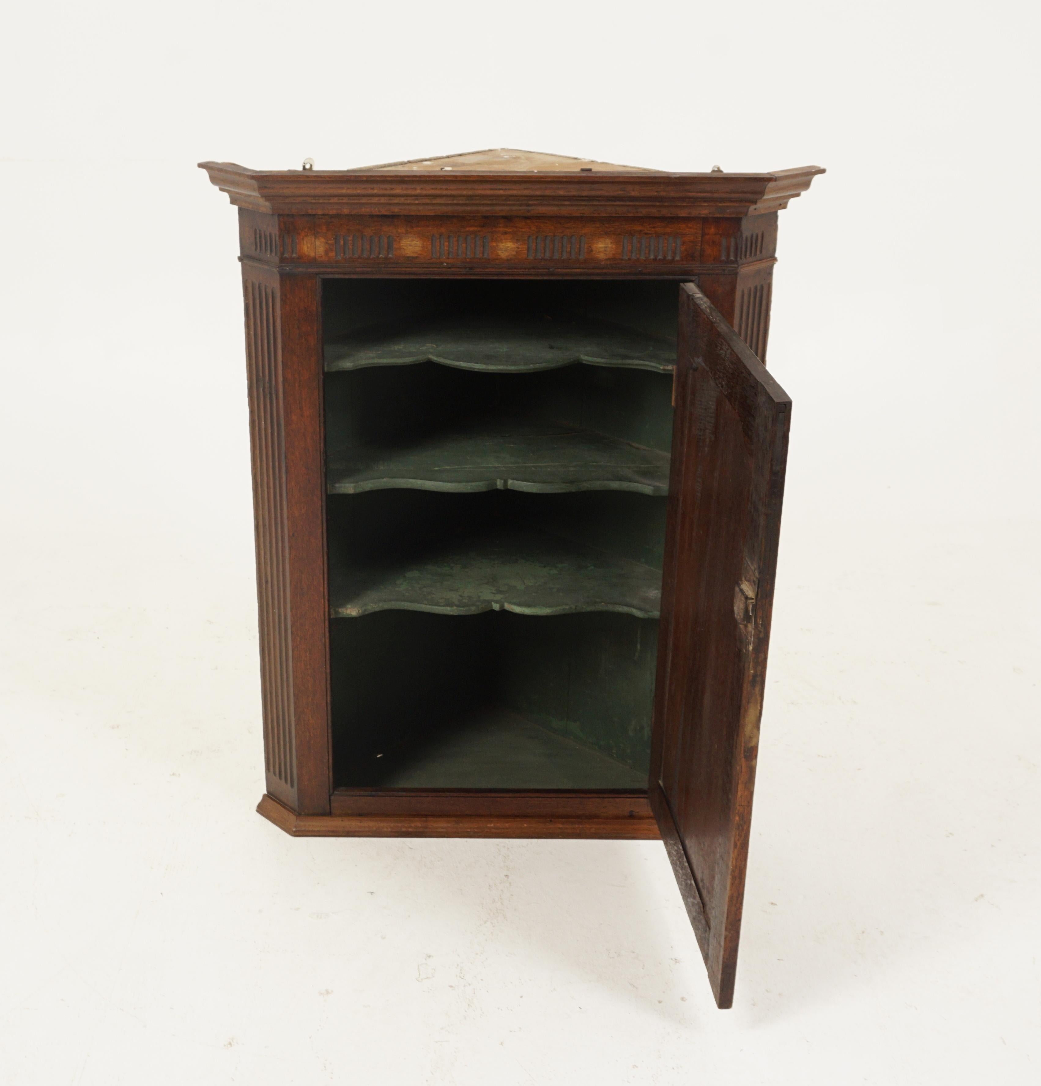 Antique hanging corner cabinet, Georgian, Inlaid, Oak, Scotland 1830, H263

Scotland 1830
Solid oak
Original finish
Shaped pediment with inlay to the top
It has a panelled door with a fancy escutcheon
Opens to reveal an interior with three shaped