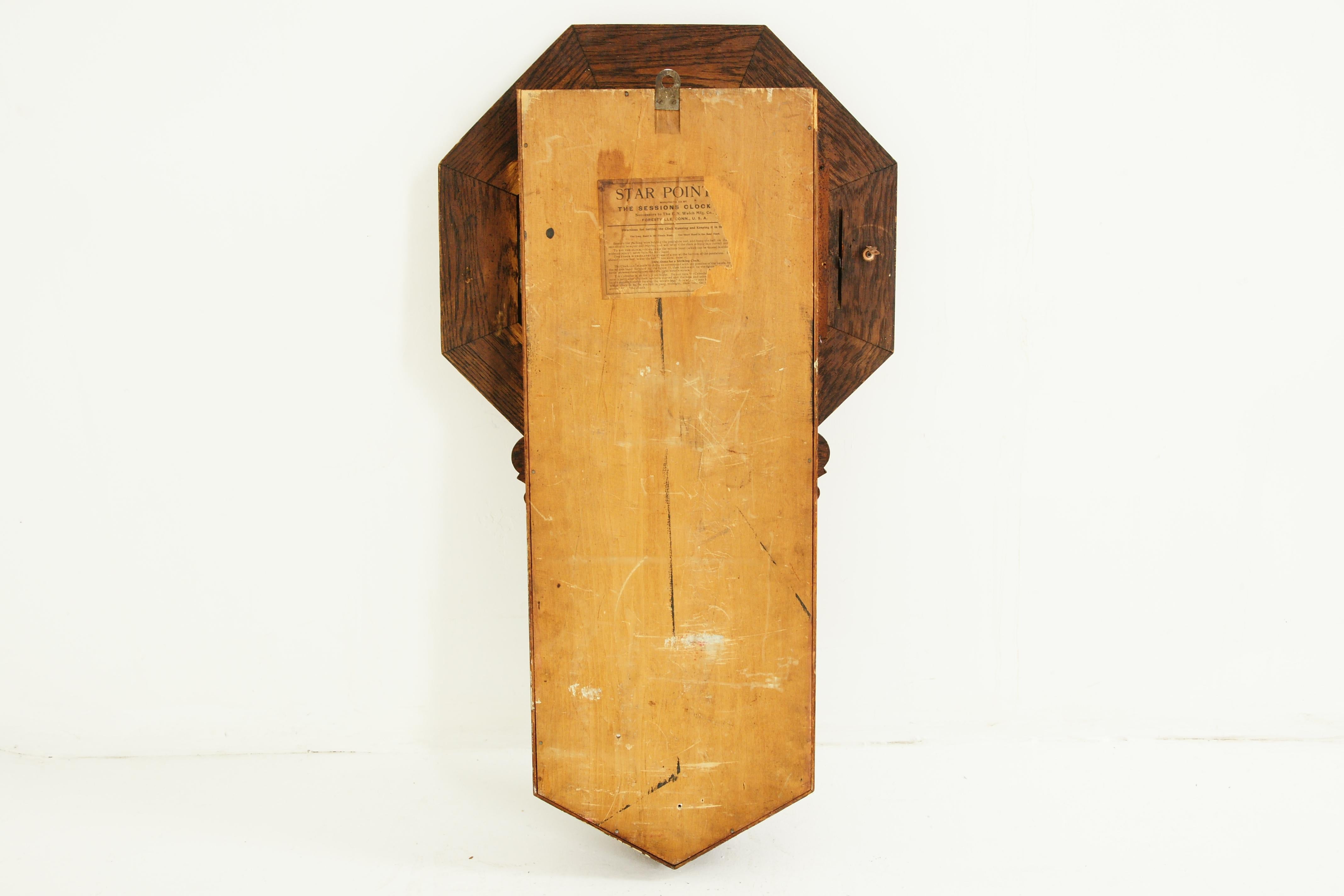 Antique hanging wall clock, eight day, carved oak, Arthur Pequegnat, Canada 1910, B2535

Canada 1910
Solid oak 
Original finish 
Carved Oak edging on the top 
Tin dial that features roman numeral demonstrations for the hours and minutes
Also