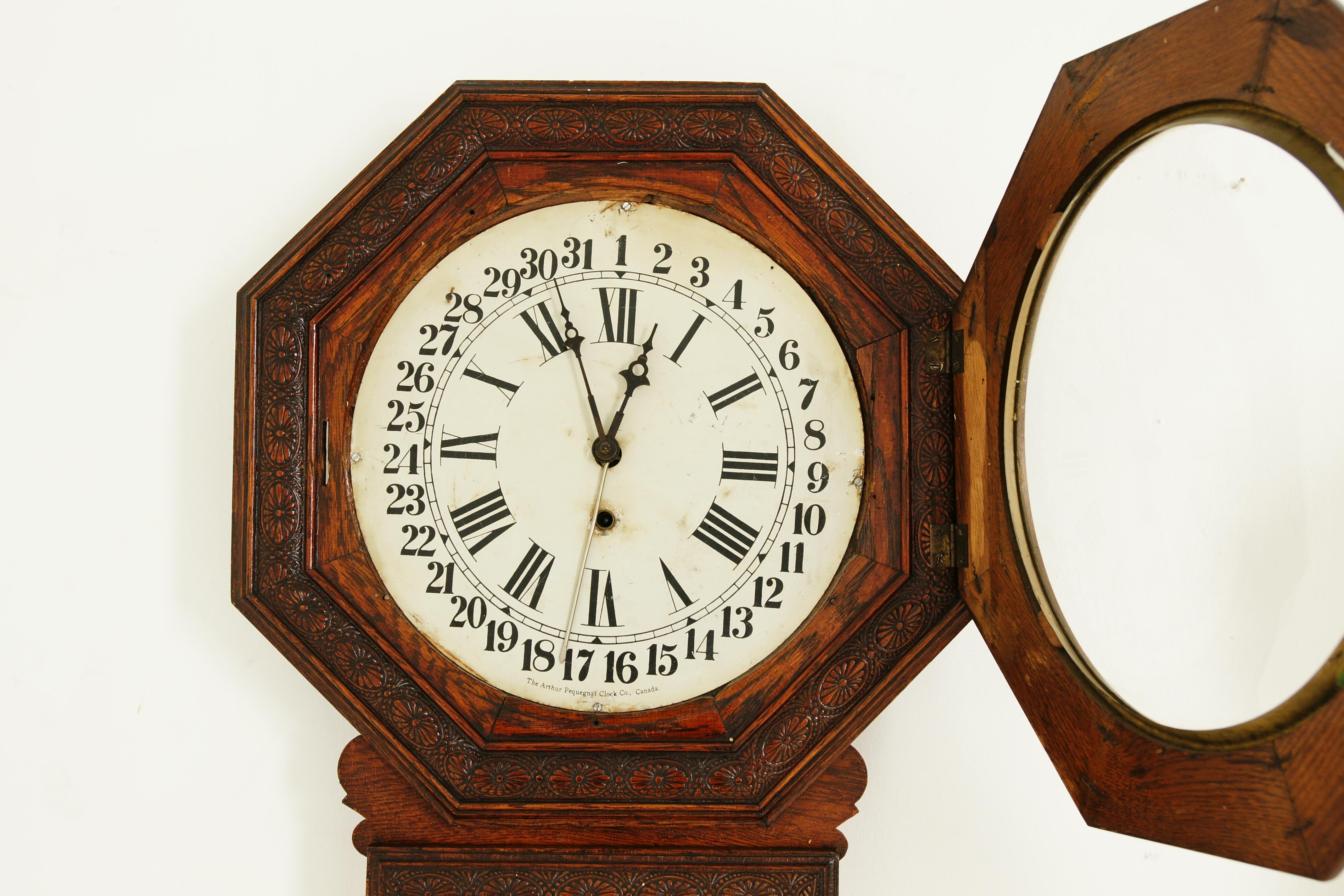 Hand-Crafted Antique Hanging Wall Clock, Eight Day, Carved Oak, Arthur Pequegnat, Canada 1910 For Sale