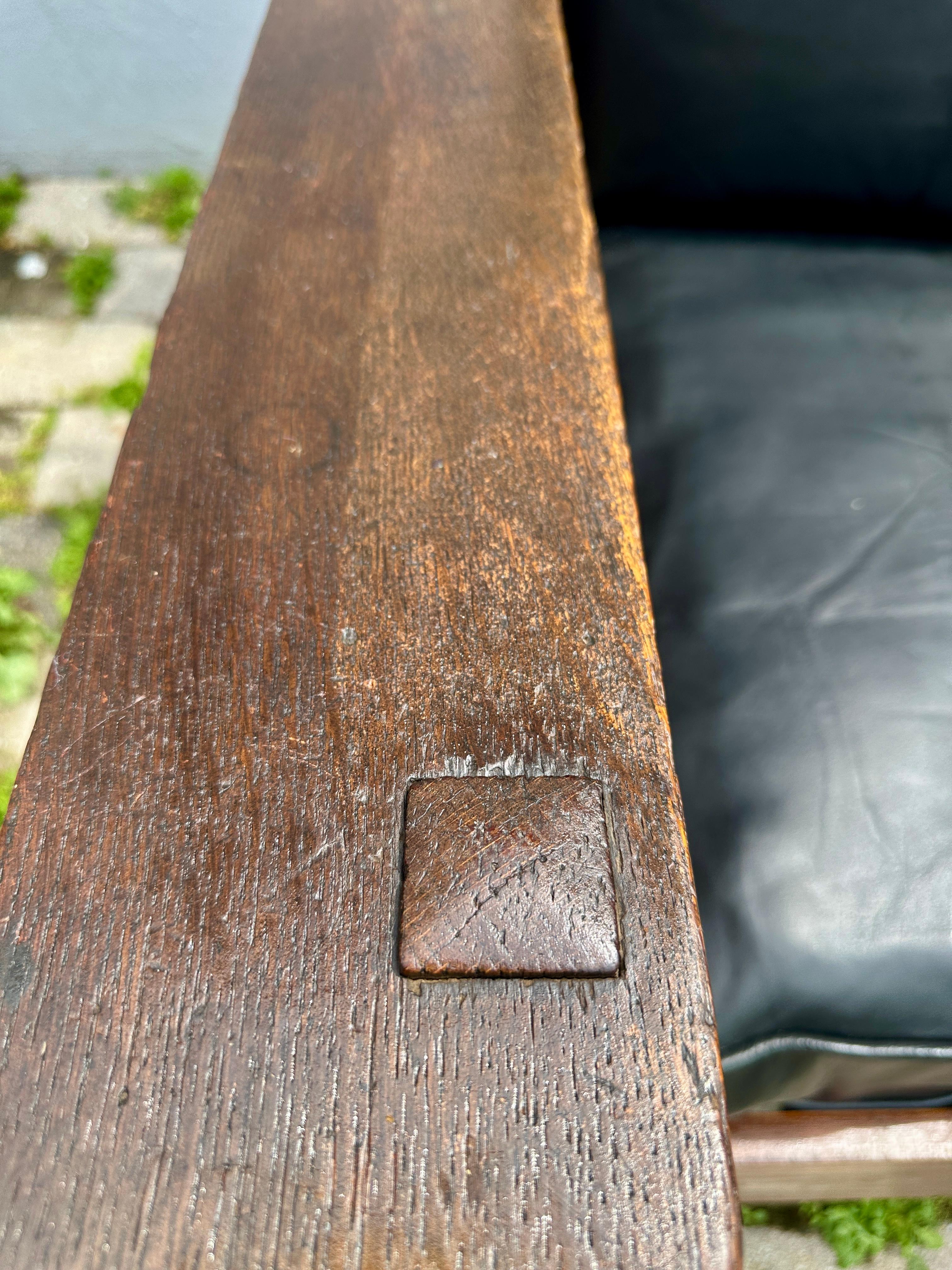This is an Antique Harden Morris Chair made in the early 1900s. The leather seat has been reupholstered with the highest quality hand-split leather. The cushion has been refilled with cotton and hair filling, NO FOAM.

We purchase most of our