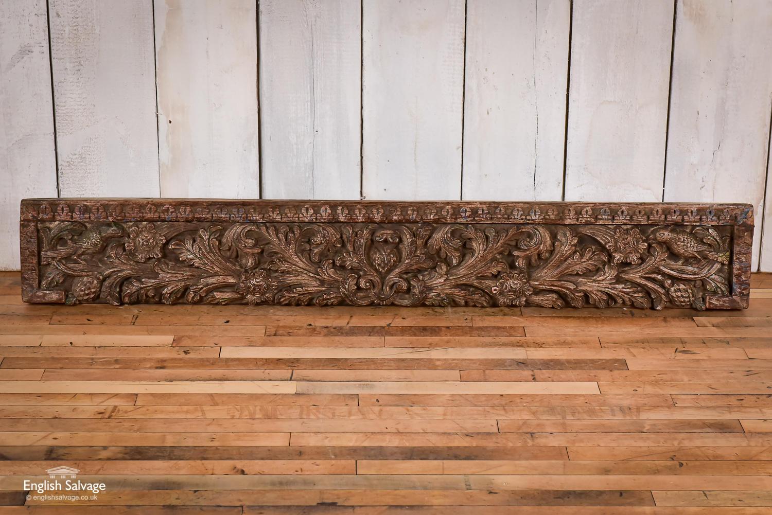Antique hand carved teak panel with foliate scrolling and acanthus patination. Some wear to wood commensurate with age.