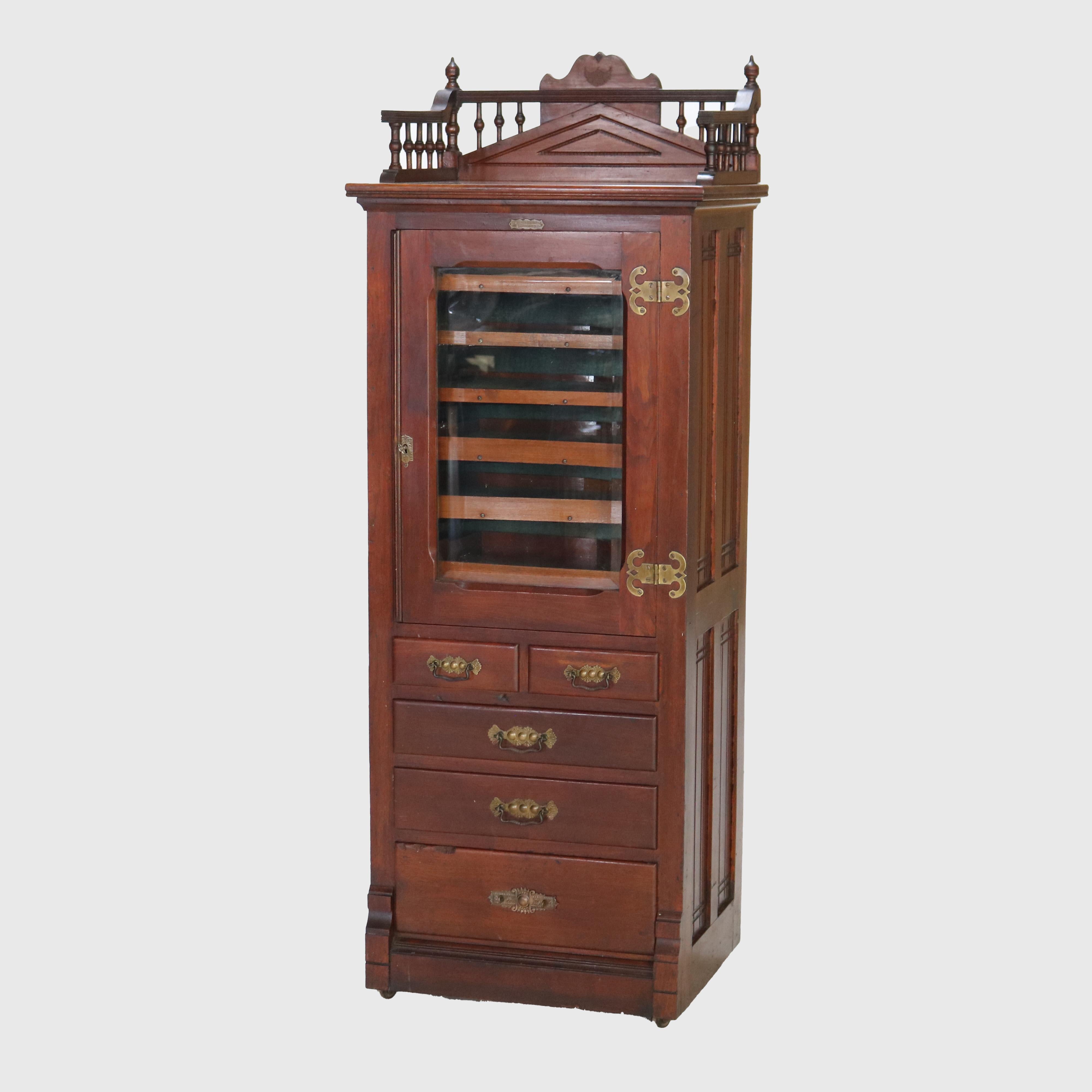Antique Harvard Co. Signed Walnut Dental Cabinet with Drawers & Lazy Susan c1900.   
64