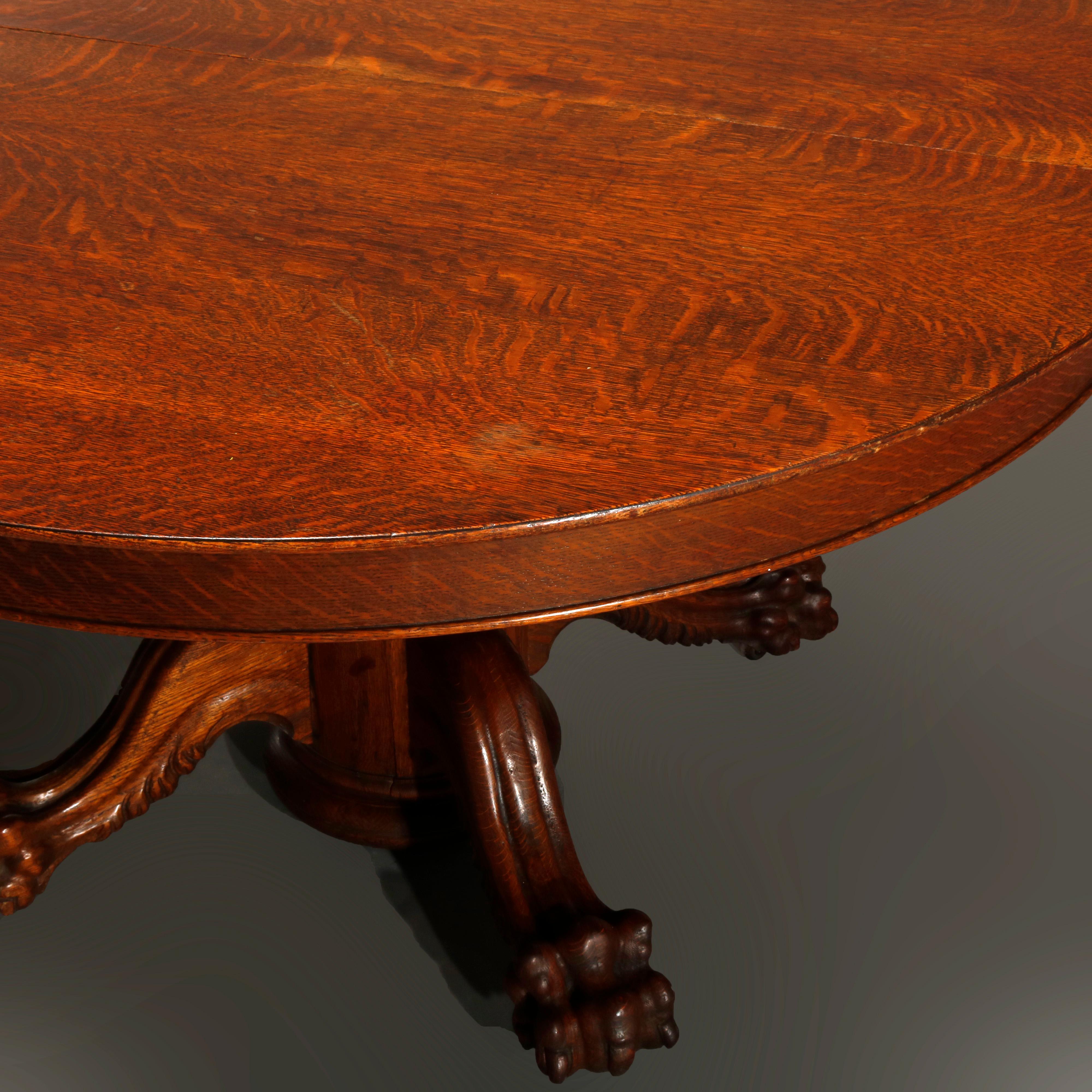 Antique Hastings Carved Oak Claw Foot Split Pedestal Dining Table, circa 1910 In Good Condition In Big Flats, NY